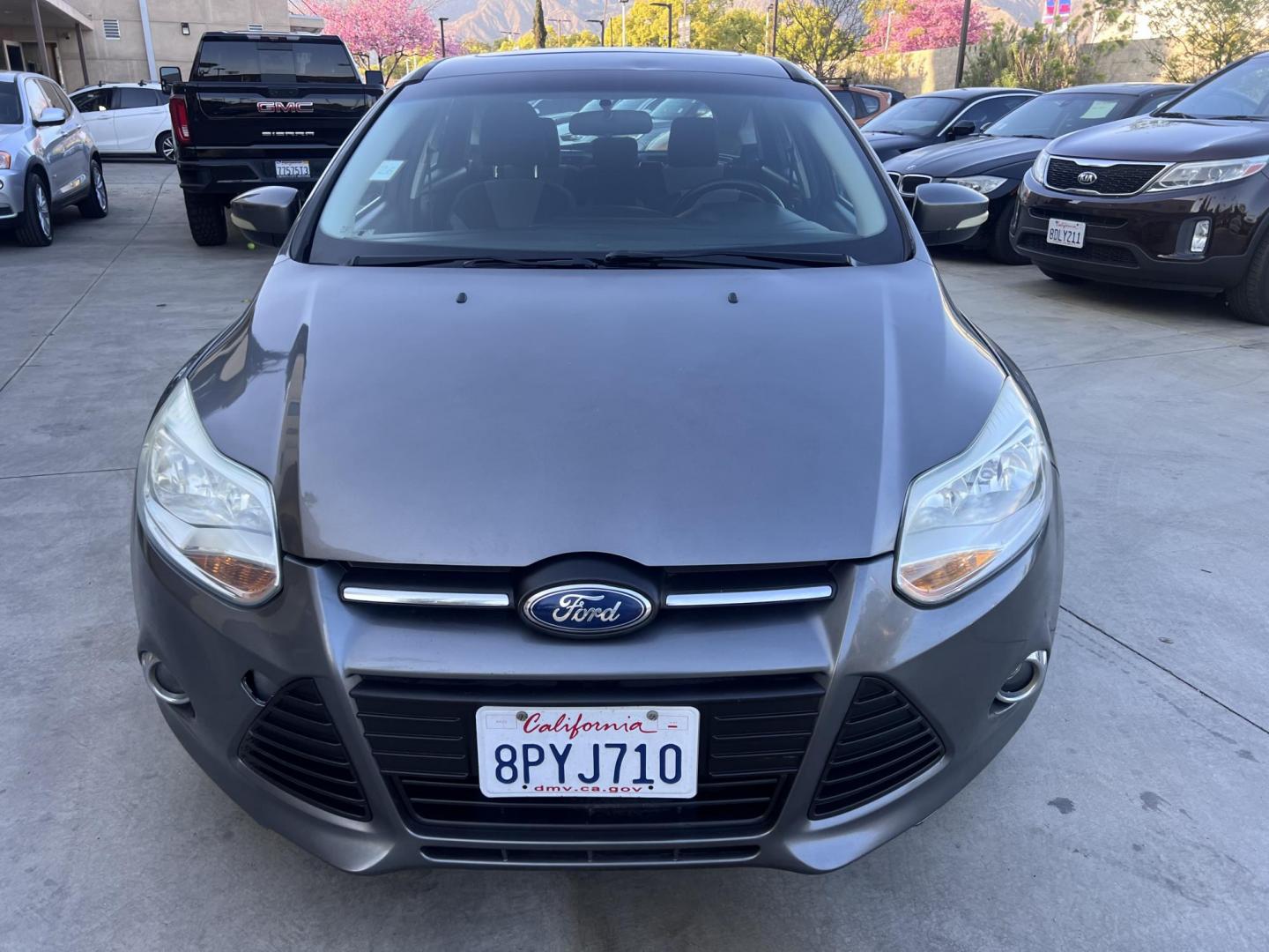 2014 Gray /Balck Ford Focus SE Hatch (1FADP3K21EL) with an 2.0L L4 DOHC 16V engine, Automatic transmission, located at 30 S. Berkeley Avenue, Pasadena, CA, 91107, (626) 248-7567, 34.145447, -118.109398 - Microsoft Sync! Moon-roof! This 2014 Ford Focus SE Hatch looks and drives good. Bad credit? We can help! We are the bank. - Photo#15