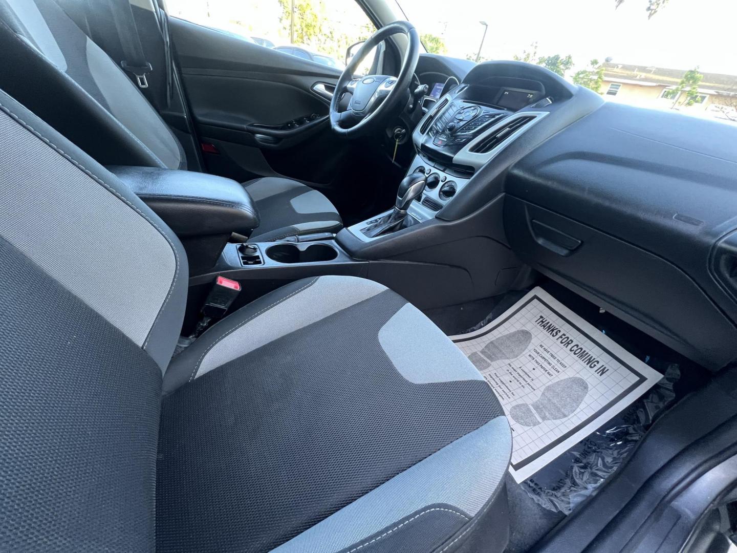 2014 Gray /Balck Ford Focus SE Hatch (1FADP3K21EL) with an 2.0L L4 DOHC 16V engine, Automatic transmission, located at 30 S. Berkeley Avenue, Pasadena, CA, 91107, (626) 248-7567, 34.145447, -118.109398 - Microsoft Sync! Moon-roof! This 2014 Ford Focus SE Hatch looks and drives good. Bad credit? We can help! We are the bank. - Photo#25
