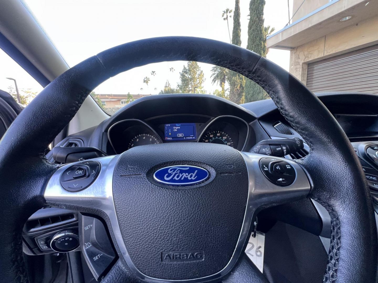 2014 Gray /Balck Ford Focus SE Hatch (1FADP3K21EL) with an 2.0L L4 DOHC 16V engine, Automatic transmission, located at 30 S. Berkeley Avenue, Pasadena, CA, 91107, (626) 248-7567, 34.145447, -118.109398 - Microsoft Sync! Moon-roof! This 2014 Ford Focus SE Hatch looks and drives good. Bad credit? We can help! We are the bank. - Photo#28