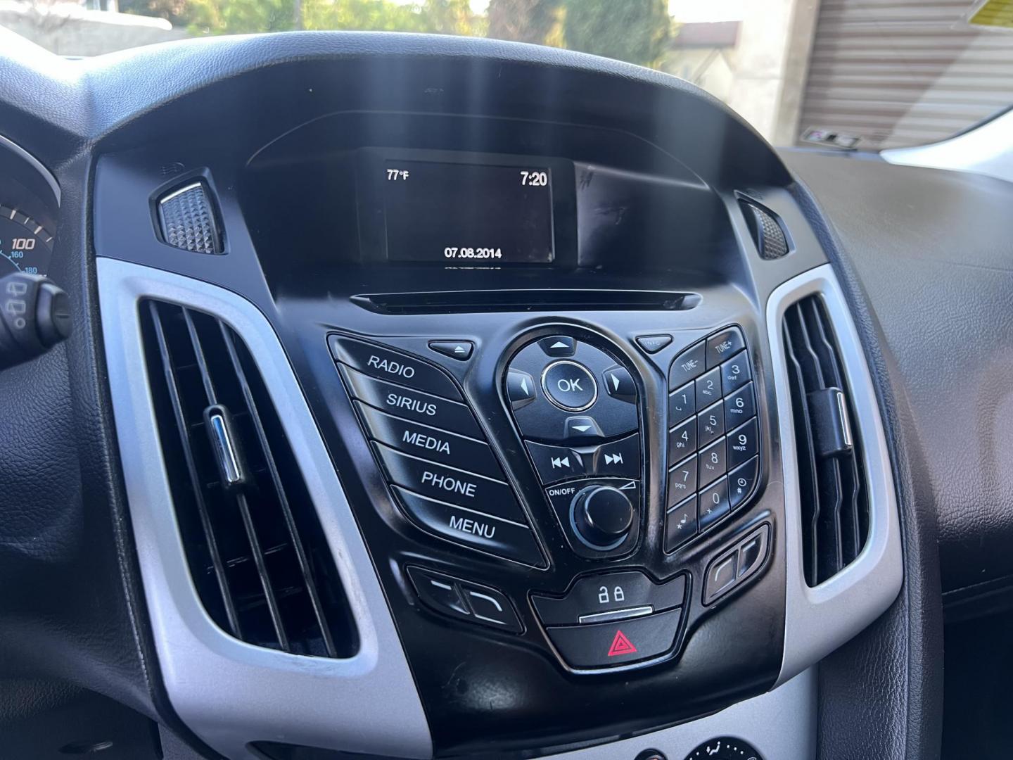 2014 Gray /Balck Ford Focus SE Hatch (1FADP3K21EL) with an 2.0L L4 DOHC 16V engine, Automatic transmission, located at 30 S. Berkeley Avenue, Pasadena, CA, 91107, (626) 248-7567, 34.145447, -118.109398 - Microsoft Sync! Moon-roof! This 2014 Ford Focus SE Hatch looks and drives good. Bad credit? We can help! We are the bank. - Photo#31