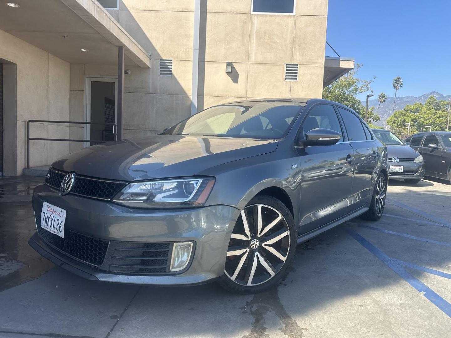 2013 Mineral Gray Metallic /Black Volkswagen Jetta 2.0T GLI (3VW4A7AJ7DM) with an 2.0L L4 DOHC 16V TURBO engine, Automatic transmission, located at 30 S. Berkeley Avenue, Pasadena, CA, 91107, (626) 248-7567, 34.145447, -118.109398 - Leather seats! Moon-roof! Push start! Navigation! Back-up camera! This 2013 Volkswagen Jetta 2.0T GLI looks and drives good. - Photo#0