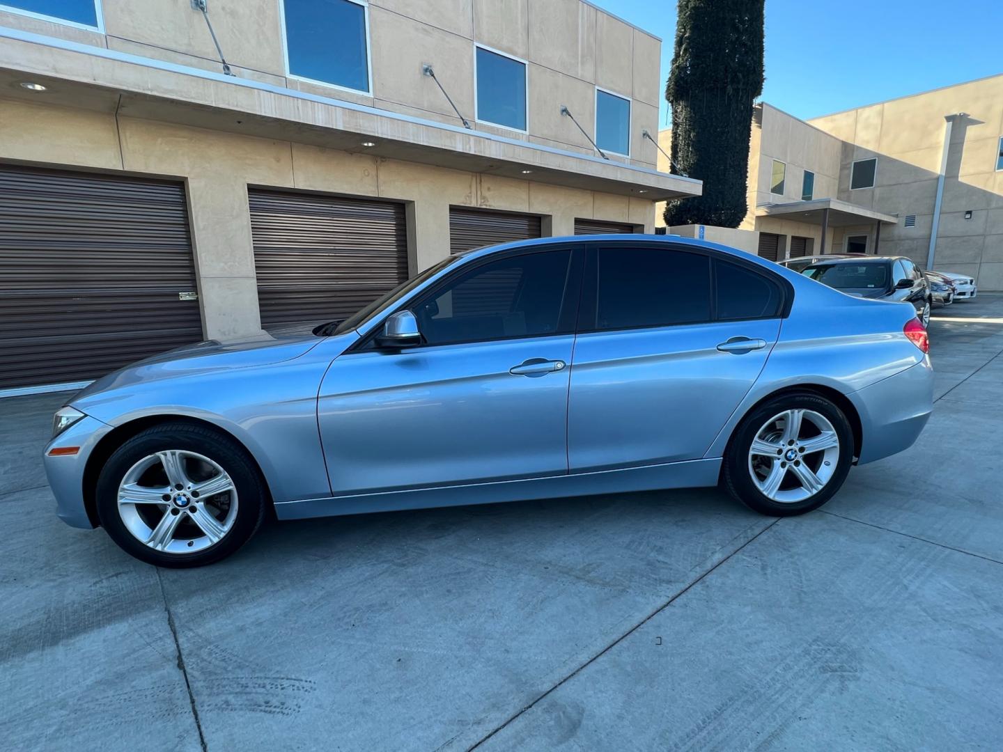 2013 BLUE /black leather BMW 3-Series 328i Sedan (WBA3A5C58DF) with an 2.0L L4 DOHC 16V engine, 8-Speed Automatic transmission, located at 30 S. Berkeley Avenue, Pasadena, CA, 91107, (626) 248-7567, 34.145447, -118.109398 - Looking for a luxurious and high-performing car that comes loaded with all the latest features? Look no further than the 2013 BMW 3-Series 328i Sedan, available at Crown City Motors. This stunning sedan is not only a head-turner on the road, but it also comes with all the latest features that you co - Photo#1