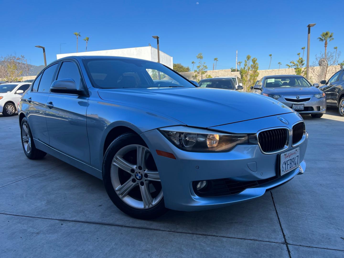 2013 BLUE /black leather BMW 3-Series 328i Sedan (WBA3A5C58DF) with an 2.0L L4 DOHC 16V engine, 8-Speed Automatic transmission, located at 30 S. Berkeley Avenue, Pasadena, CA, 91107, (626) 248-7567, 34.145447, -118.109398 - Looking for a luxurious and high-performing car that comes loaded with all the latest features? Look no further than the 2013 BMW 3-Series 328i Sedan, available at Crown City Motors. This stunning sedan is not only a head-turner on the road, but it also comes with all the latest features that you co - Photo#4