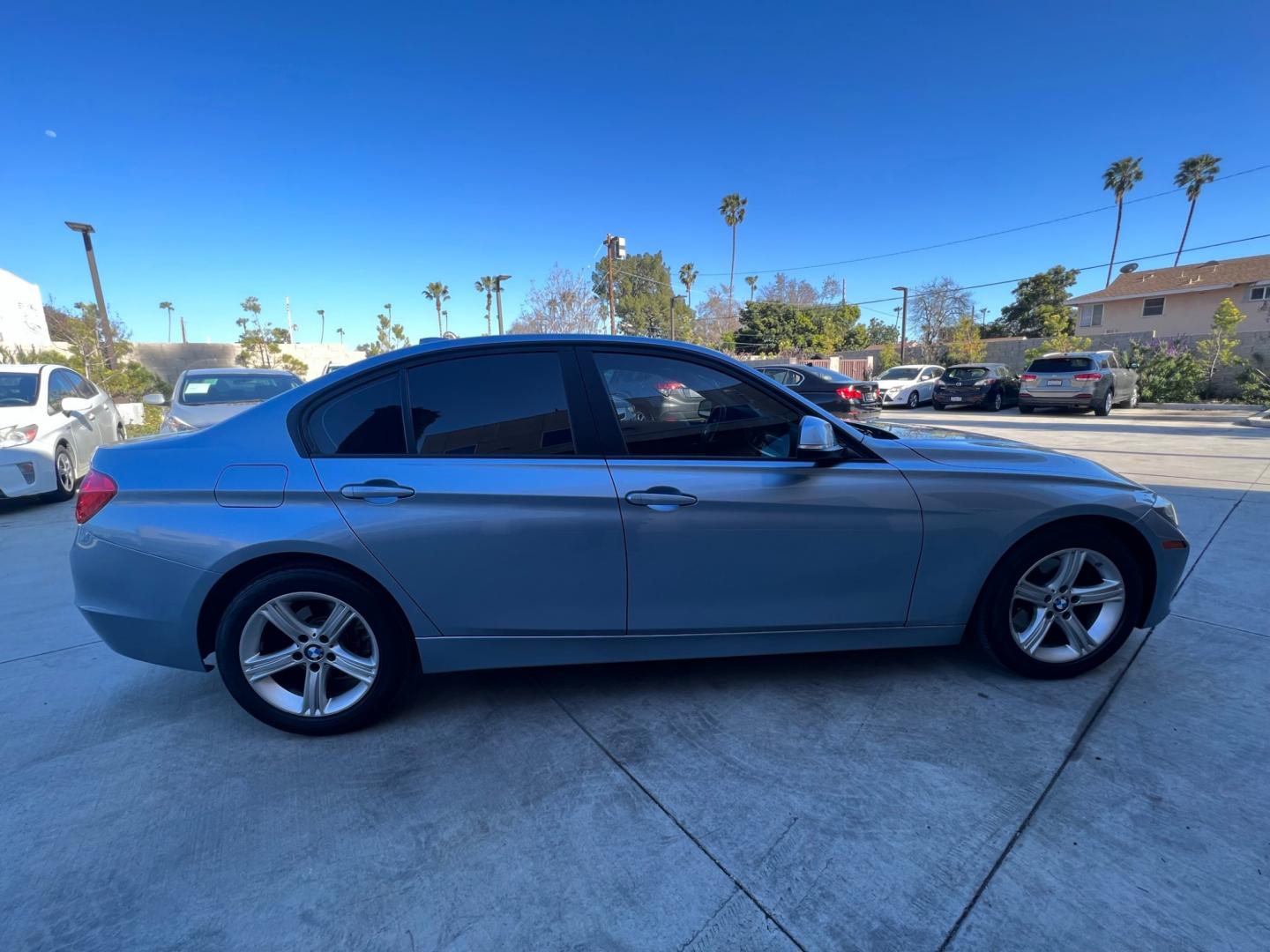 2013 BLUE /black leather BMW 3-Series 328i Sedan (WBA3A5C58DF) with an 2.0L L4 DOHC 16V engine, 8-Speed Automatic transmission, located at 30 S. Berkeley Avenue, Pasadena, CA, 91107, (626) 248-7567, 34.145447, -118.109398 - Looking for a luxurious and high-performing car that comes loaded with all the latest features? Look no further than the 2013 BMW 3-Series 328i Sedan, available at Crown City Motors. This stunning sedan is not only a head-turner on the road, but it also comes with all the latest features that you co - Photo#5