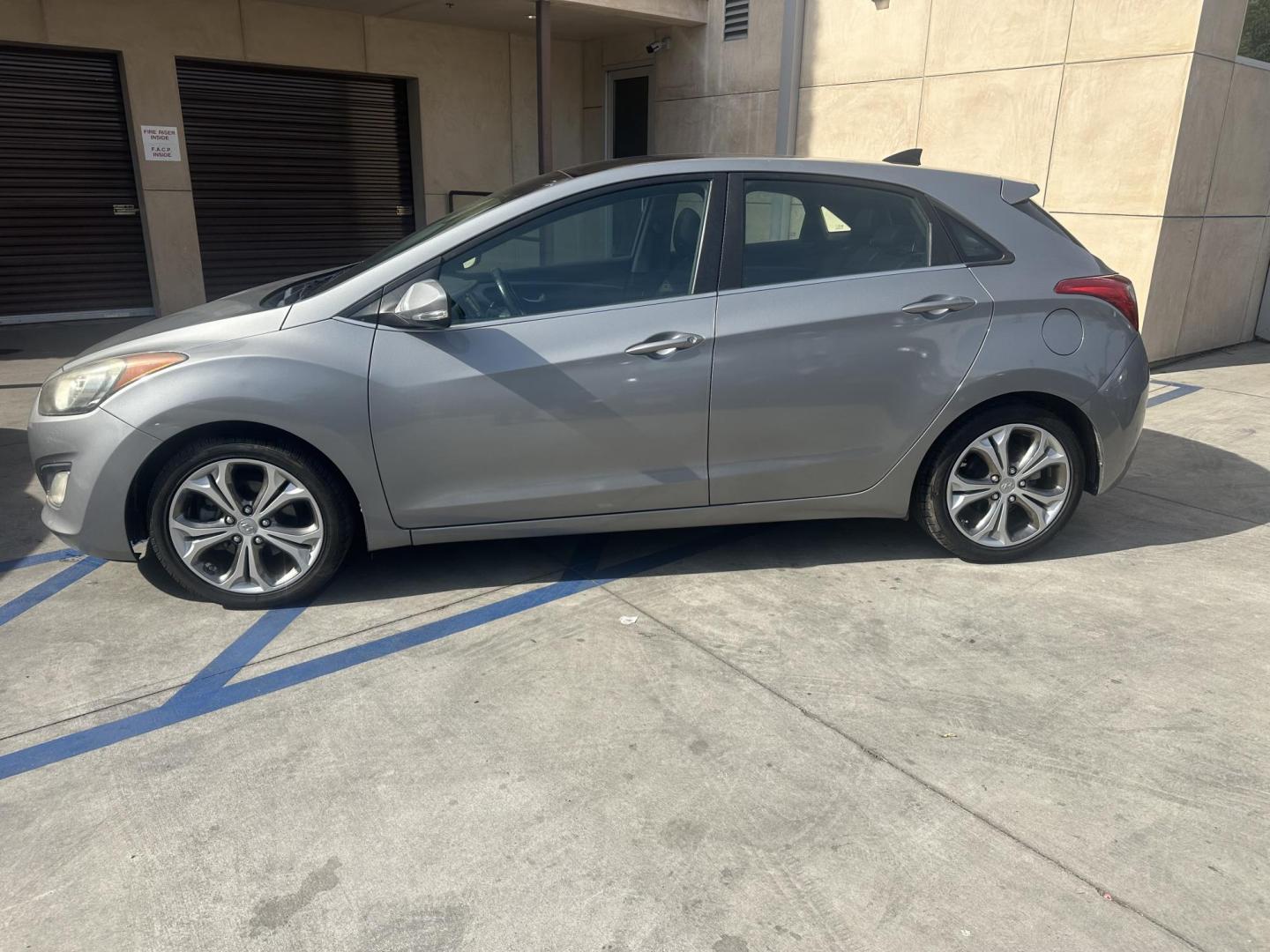 2013 /blue Hyundai Elantra GT A/T (KMHD35LE2DU) with an 1.8L L4 16V DOHC engine, 6-Speed manual transmission, located at 30 S. Berkeley Avenue, Pasadena, CA, 91107, (626) 248-7567, 34.145447, -118.109398 - Leather Seats! New Tires! Low Miles! This HYUNDAI ELANTRA looks and drives good! Bad credit? We can help! We are the bank. All our cars are thoroughly inspected and reconditioned by our technicians. FREE CARFAX report. Stop by or call to speak with our friendly staff. Whether you have bad credit, n - Photo#3