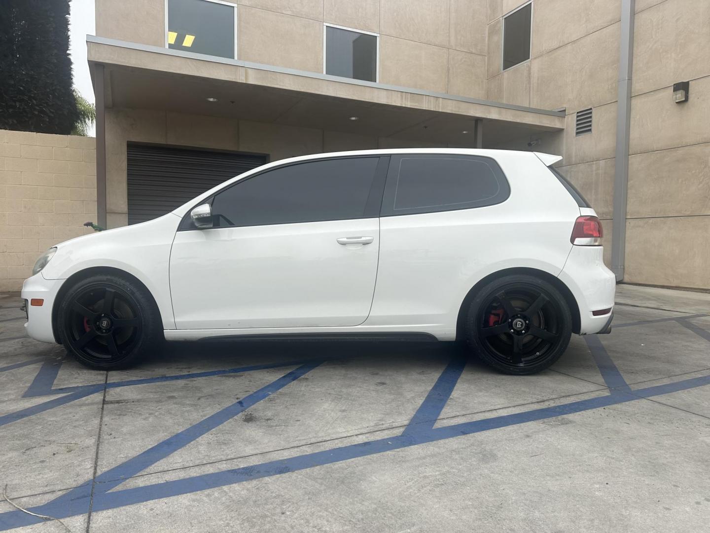 2010 White /Black Volkswagen GTI 2.0T Coupe PZEV (WVWFD7AJ9AW) with an 2.0L L4 DOHC 16V TURBO engine, Automatic transmission, located at 30 S. Berkeley Avenue, Pasadena, CA, 91107, (626) 248-7567, 34.145447, -118.109398 - Leather Seats! Moon-roof! This 2010 Volkswagen GTI 2.0T Coupe PZEV looks and drives well. This vehicle comes with a dealer 30 day / 1,000 Mile Warranty ( call us for details) and with Options up to 5 years / 100,000 Mile Warranty. Bad credit? We can help! We are the bank. Buy with confidence! All o - Photo#1