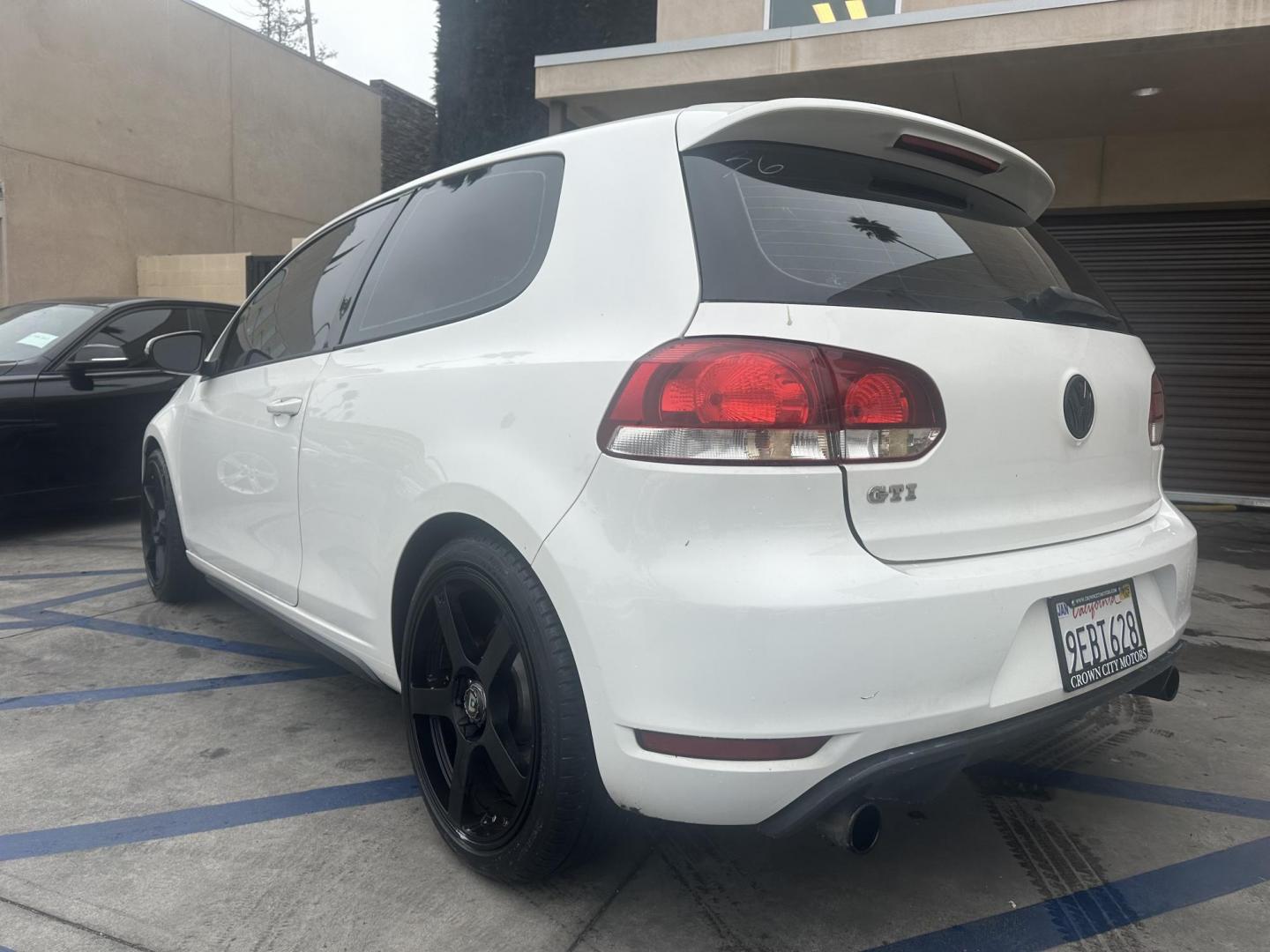 2010 White /Black Volkswagen GTI 2.0T Coupe PZEV (WVWFD7AJ9AW) with an 2.0L L4 DOHC 16V TURBO engine, Automatic transmission, located at 30 S. Berkeley Avenue, Pasadena, CA, 91107, (626) 248-7567, 34.145447, -118.109398 - Leather Seats! Moon-roof! This 2010 Volkswagen GTI 2.0T Coupe PZEV looks and drives well. This vehicle comes with a dealer 30 day / 1,000 Mile Warranty ( call us for details) and with Options up to 5 years / 100,000 Mile Warranty. Bad credit? We can help! We are the bank. Buy with confidence! All o - Photo#3