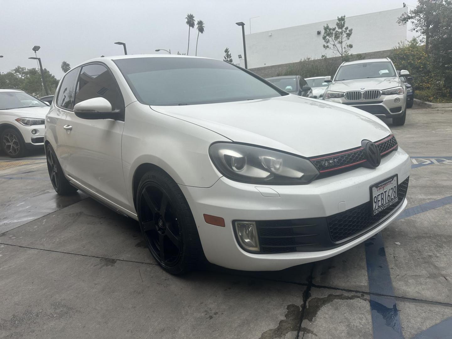 2010 White /Black Volkswagen GTI 2.0T Coupe PZEV (WVWFD7AJ9AW) with an 2.0L L4 DOHC 16V TURBO engine, Automatic transmission, located at 30 S. Berkeley Avenue, Pasadena, CA, 91107, (626) 248-7567, 34.145447, -118.109398 - Leather Seats! Moon-roof! This 2010 Volkswagen GTI 2.0T Coupe PZEV looks and drives well. This vehicle comes with a dealer 30 day / 1,000 Mile Warranty ( call us for details) and with Options up to 5 years / 100,000 Mile Warranty. Bad credit? We can help! We are the bank. Buy with confidence! All o - Photo#7