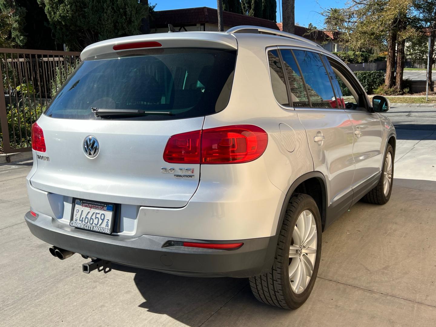 2013 Silver /BLACK Volkswagen Tiguan 2.0T S 4Motion (WVGBV7AX5DW) with an 2.0L L4 DOHC 16V TURBO engine, 6-Speed Automatic transmission, located at 30 S. Berkeley Avenue, Pasadena, CA, 91107, (626) 248-7567, 34.145447, -118.109398 - Looking for a reliable car, truck, or SUV in the heart of Pasadena, CA? The 2013 Volkswagen Tiguan 2.0T S 4Motion may be the answer you've been seeking. This SUV isn’t just a mode of transportation; it’s an emblem of style, power, and durability, right from a trusted BHPH dealer in Pasadena. For - Photo#4