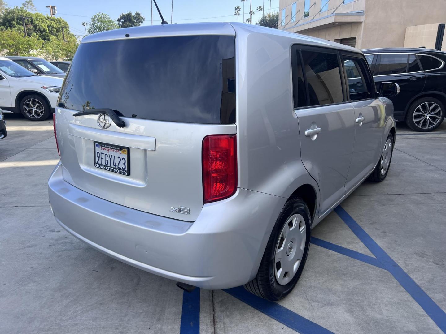 2008 Silver Scion xB Wagon (JTLKE50EX81) with an 2.4L L4 DOHC 16V engine, AUTOMATIC transmission, located at 30 S. Berkeley Avenue, Pasadena, CA, 91107, (626) 248-7567, 34.145447, -118.109398 - NEW TIRES, NEW , RUNS WELL This Scion looks and drives good. bad Credit? We Can Help! Call us today and ask about our finance and lease options . This Scion is equipped with the following A-C Adjustable Steering Wheel AM-FM Stereo Automatic Headlights Auxiliary Audio Input Bucket Seats CD Player Cr - Photo#7
