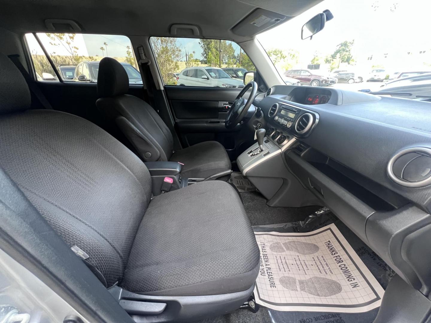 2008 Silver Scion xB Wagon (JTLKE50EX81) with an 2.4L L4 DOHC 16V engine, AUTOMATIC transmission, located at 30 S. Berkeley Avenue, Pasadena, CA, 91107, (626) 248-7567, 34.145447, -118.109398 - NEW TIRES, NEW , RUNS WELL This Scion looks and drives good. bad Credit? We Can Help! Call us today and ask about our finance and lease options . This Scion is equipped with the following A-C Adjustable Steering Wheel AM-FM Stereo Automatic Headlights Auxiliary Audio Input Bucket Seats CD Player Cr - Photo#15