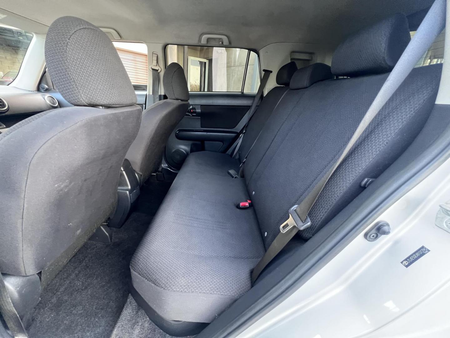 2008 Silver Scion xB Wagon (JTLKE50EX81) with an 2.4L L4 DOHC 16V engine, AUTOMATIC transmission, located at 30 S. Berkeley Avenue, Pasadena, CA, 91107, (626) 248-7567, 34.145447, -118.109398 - NEW TIRES, NEW , RUNS WELL This Scion looks and drives good. bad Credit? We Can Help! Call us today and ask about our finance and lease options . This Scion is equipped with the following A-C Adjustable Steering Wheel AM-FM Stereo Automatic Headlights Auxiliary Audio Input Bucket Seats CD Player Cr - Photo#18