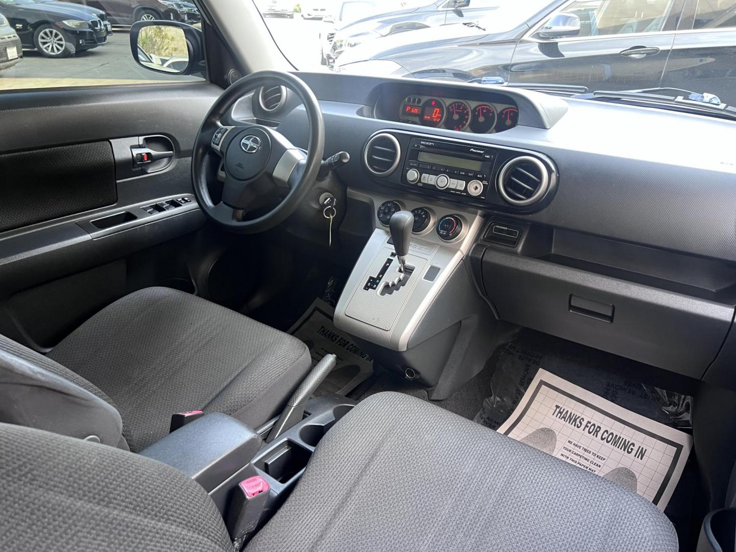 2008 Silver Scion xB Wagon (JTLKE50EX81) with an 2.4L L4 DOHC 16V engine, AUTOMATIC transmission, located at 30 S. Berkeley Avenue, Pasadena, CA, 91107, (626) 248-7567, 34.145447, -118.109398 - NEW TIRES, NEW , RUNS WELL This Scion looks and drives good. bad Credit? We Can Help! Call us today and ask about our finance and lease options . This Scion is equipped with the following A-C Adjustable Steering Wheel AM-FM Stereo Automatic Headlights Auxiliary Audio Input Bucket Seats CD Player Cr - Photo#20