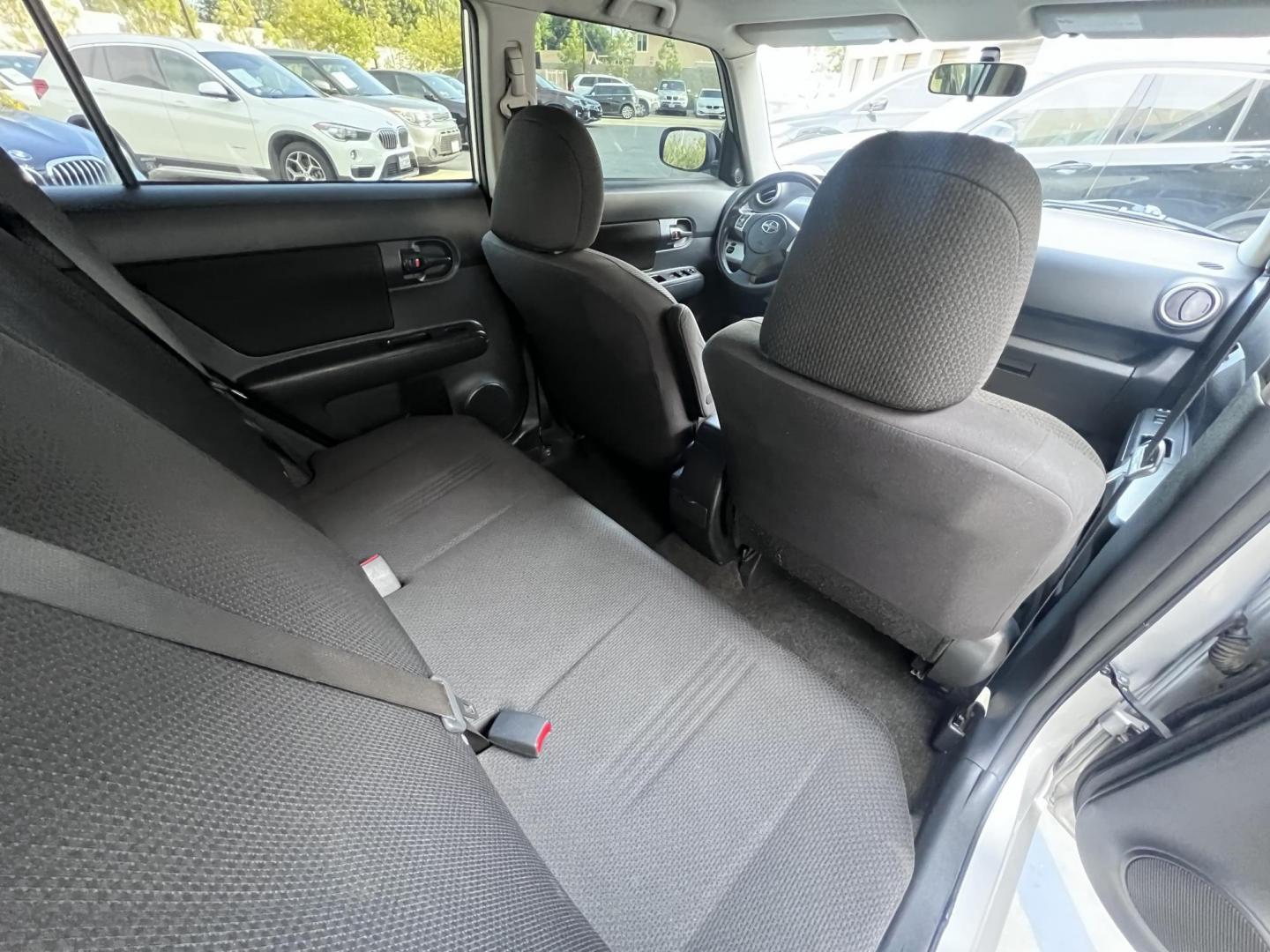 2008 Silver Scion xB Wagon (JTLKE50EX81) with an 2.4L L4 DOHC 16V engine, AUTOMATIC transmission, located at 30 S. Berkeley Avenue, Pasadena, CA, 91107, (626) 248-7567, 34.145447, -118.109398 - NEW TIRES, NEW , RUNS WELL This Scion looks and drives good. bad Credit? We Can Help! Call us today and ask about our finance and lease options . This Scion is equipped with the following A-C Adjustable Steering Wheel AM-FM Stereo Automatic Headlights Auxiliary Audio Input Bucket Seats CD Player Cr - Photo#22