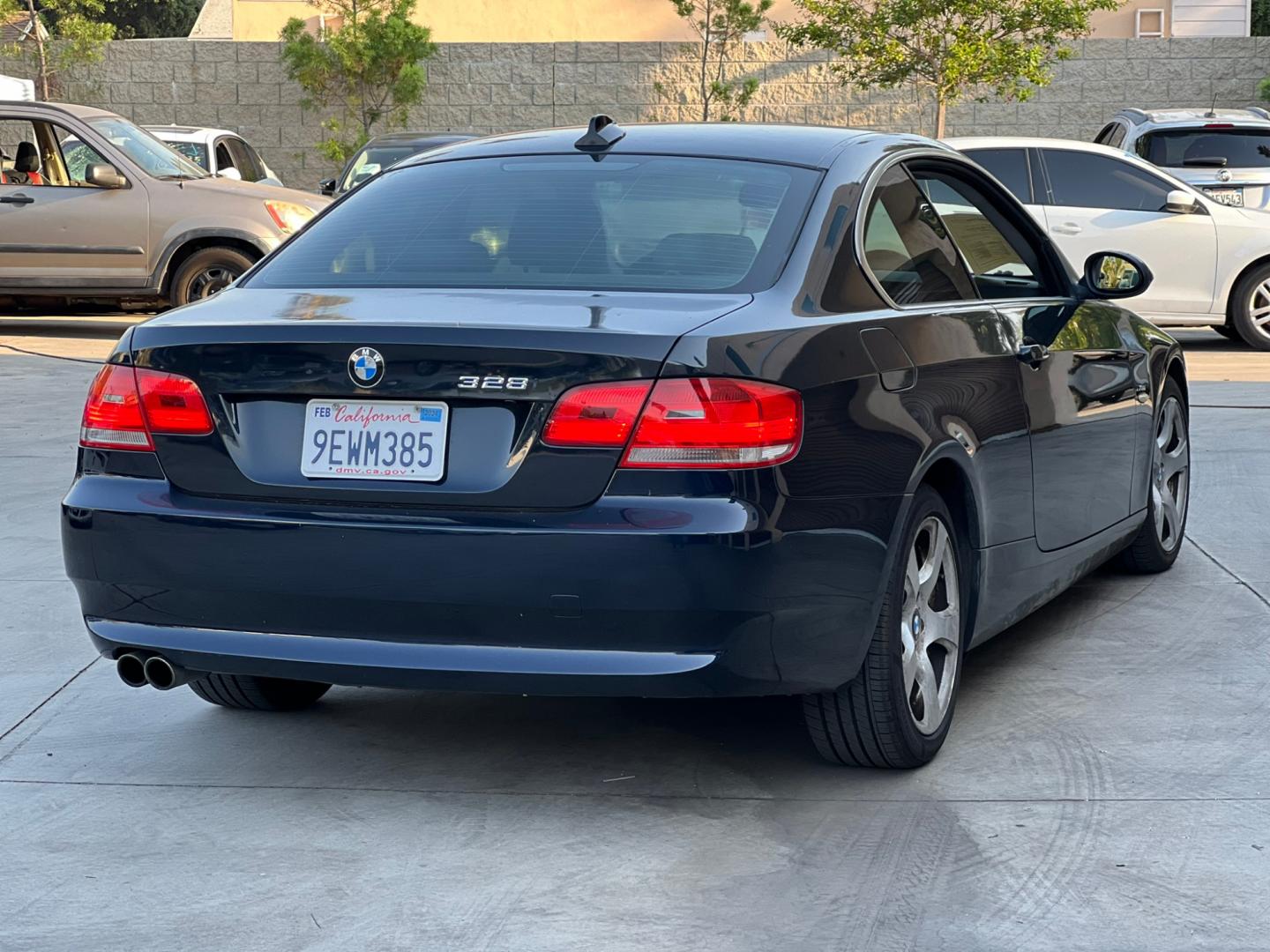 2009 BLACK /Gray BMW 3-Series 328xi Coupe (WBAWC33539P) with an 3.0L L6 DOHC 24V engine, Automatic transmission, located at 30 S. Berkeley Avenue, Pasadena, CA, 91107, (626) 248-7567, 34.145447, -118.109398 - Photo#3