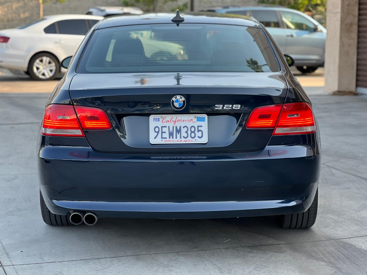 2009 BLACK /Gray BMW 3-Series 328xi Coupe (WBAWC33539P) with an 3.0L L6 DOHC 24V engine, Automatic transmission, located at 30 S. Berkeley Avenue, Pasadena, CA, 91107, (626) 248-7567, 34.145447, -118.109398 - Photo#1