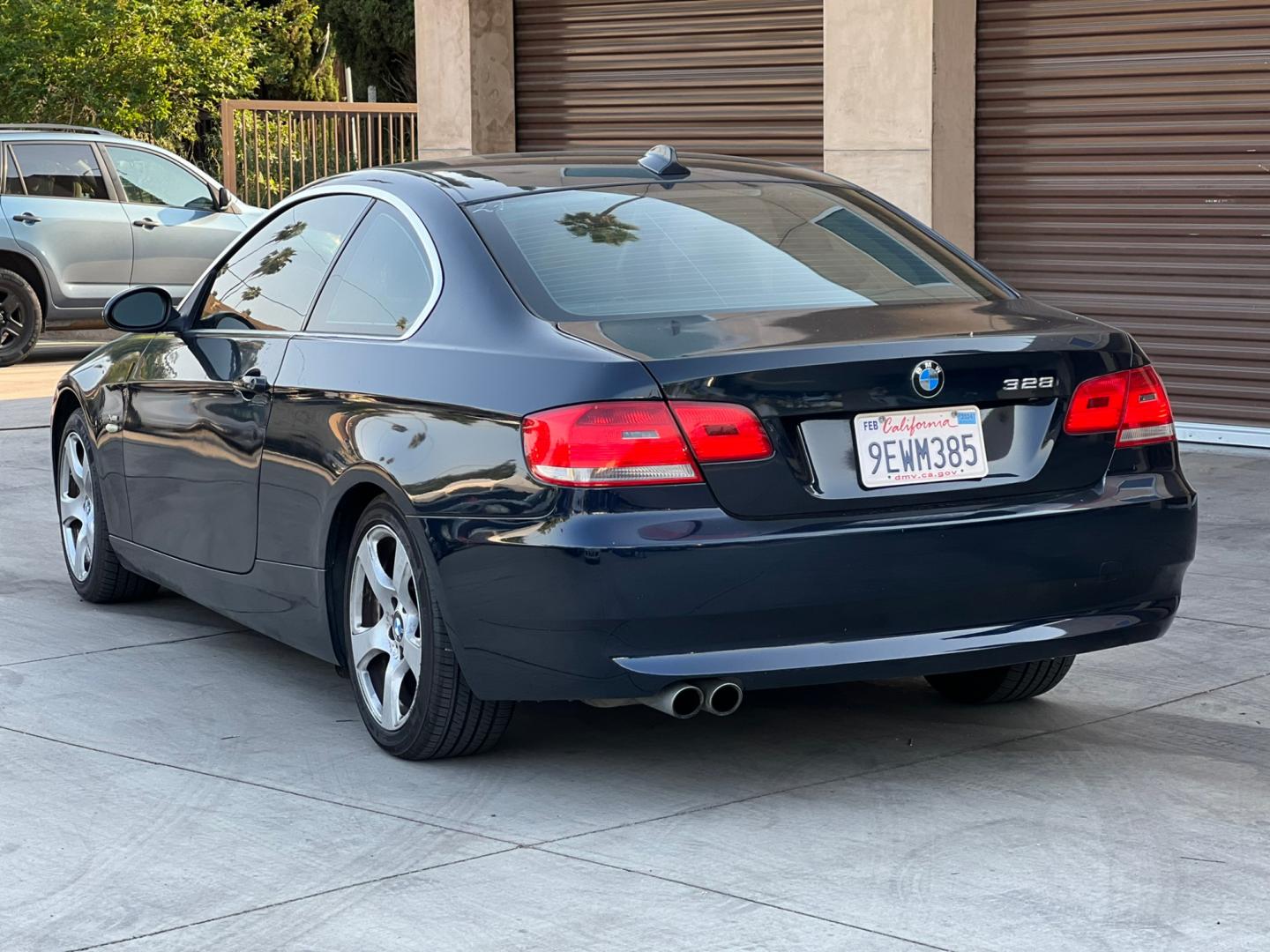 2009 BLACK /Gray BMW 3-Series 328xi Coupe (WBAWC33539P) with an 3.0L L6 DOHC 24V engine, Automatic transmission, located at 30 S. Berkeley Avenue, Pasadena, CA, 91107, (626) 248-7567, 34.145447, -118.109398 - Photo#2