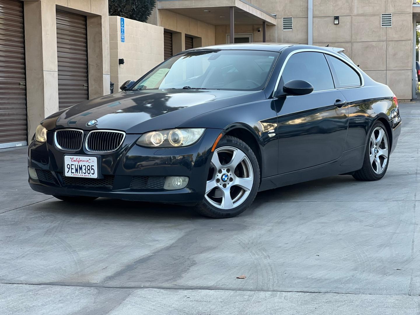 2009 BLACK /Gray BMW 3-Series 328xi Coupe (WBAWC33539P) with an 3.0L L6 DOHC 24V engine, Automatic transmission, located at 30 S. Berkeley Avenue, Pasadena, CA, 91107, (626) 248-7567, 34.145447, -118.109398 - Photo#0