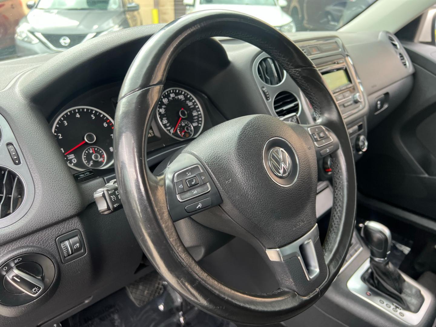 2014 White Volkswagen Tiguan S (WVGAV3AX0EW) with an 2.0L L4 DOHC 16V TURBO engine, AUTOMATIC transmission, located at 30 S. Berkeley Avenue, Pasadena, CA, 91107, (626) 248-7567, 34.145447, -118.109398 - Photo#10