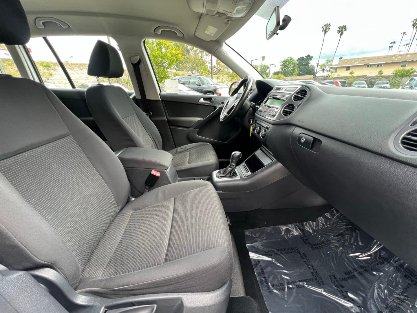 2014 White Volkswagen Tiguan S (WVGAV3AX0EW) with an 2.0L L4 DOHC 16V TURBO engine, AUTOMATIC transmission, located at 30 S. Berkeley Avenue, Pasadena, CA, 91107, (626) 248-7567, 34.145447, -118.109398 - Photo#15