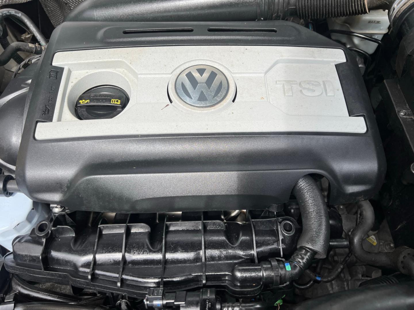 2014 White Volkswagen Tiguan S (WVGAV3AX0EW) with an 2.0L L4 DOHC 16V TURBO engine, AUTOMATIC transmission, located at 30 S. Berkeley Avenue, Pasadena, CA, 91107, (626) 248-7567, 34.145447, -118.109398 - Crown City Motors is a used “Buy Here Pay Here” car dealer in Pasadena CA. “Buy Here Pay Here” financing, means that when you purchase your vehicle from our dealership, that you make the payments to the dealership as well. We do not need the banks approval to get you approved for a used auto - Photo#21