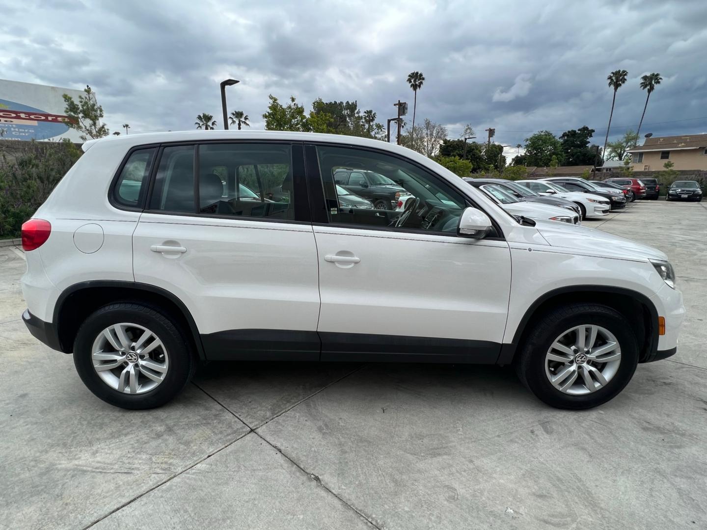 2014 White Volkswagen Tiguan S (WVGAV3AX0EW) with an 2.0L L4 DOHC 16V TURBO engine, AUTOMATIC transmission, located at 30 S. Berkeley Avenue, Pasadena, CA, 91107, (626) 248-7567, 34.145447, -118.109398 - Photo#5