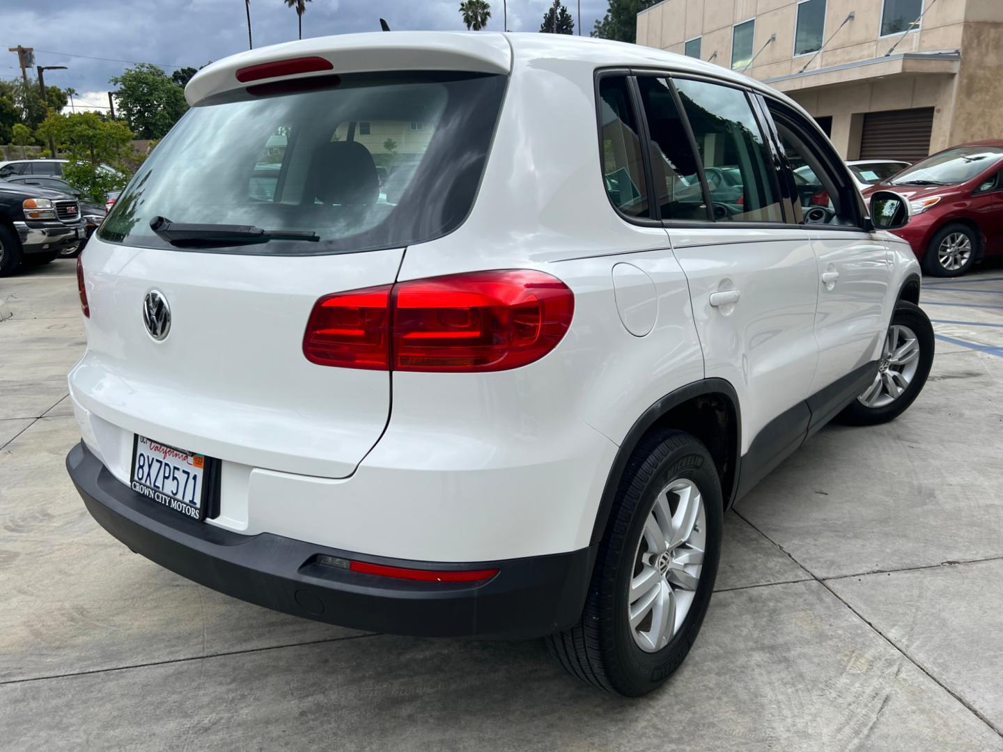 2014 White Volkswagen Tiguan S (WVGAV3AX0EW) with an 2.0L L4 DOHC 16V TURBO engine, AUTOMATIC transmission, located at 30 S. Berkeley Avenue, Pasadena, CA, 91107, (626) 248-7567, 34.145447, -118.109398 - Photo#6