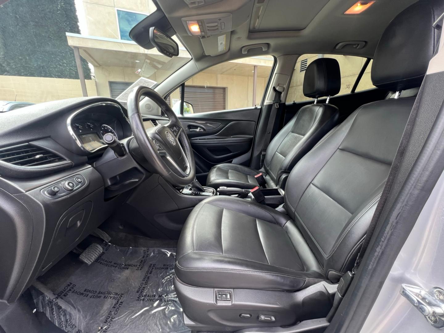 2018 Silver Buick Encore Essence AWD (KL4CJGSB7JB) with an 1.4L L4 DOHC 16V TURBO engine, 6A transmission, located at 30 S. Berkeley Avenue, Pasadena, CA, 91107, (626) 248-7567, 34.145447, -118.109398 - Crown City Motors is a used “Buy Here Pay Here” car dealer in Pasadena CA. “Buy Here Pay Here” financing, means that when you purchase your vehicle from our dealership, that you make the payments to the dealership as well. We do not need the banks approval to get you approved for a used auto - Photo#10