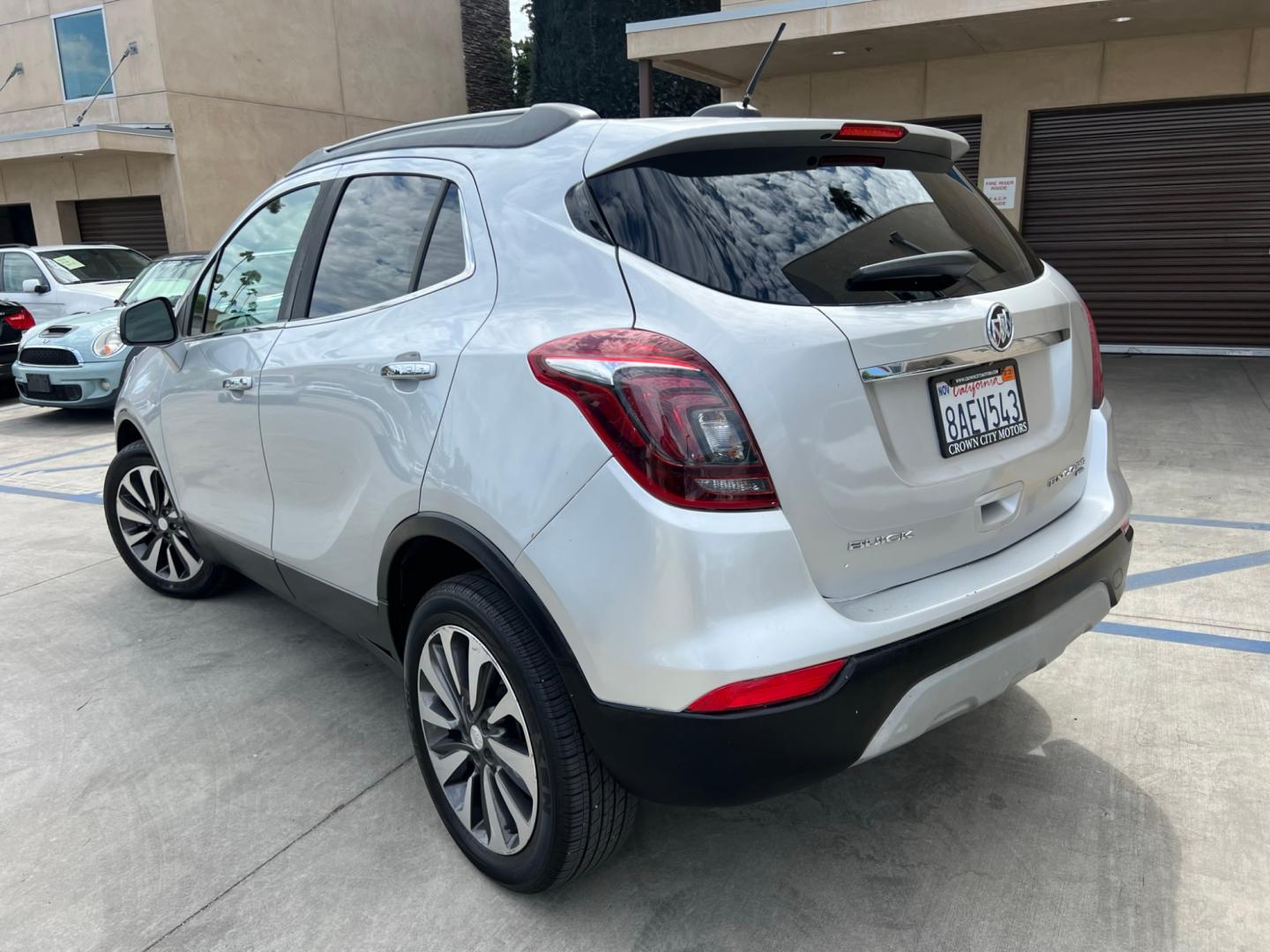 2018 Silver Buick Encore Essence AWD (KL4CJGSB7JB) with an 1.4L L4 DOHC 16V TURBO engine, 6A transmission, located at 30 S. Berkeley Avenue, Pasadena, CA, 91107, (626) 248-7567, 34.145447, -118.109398 - Crown City Motors is a used “Buy Here Pay Here” car dealer in Pasadena CA. “Buy Here Pay Here” financing, means that when you purchase your vehicle from our dealership, that you make the payments to the dealership as well. We do not need the banks approval to get you approved for a used auto - Photo#2