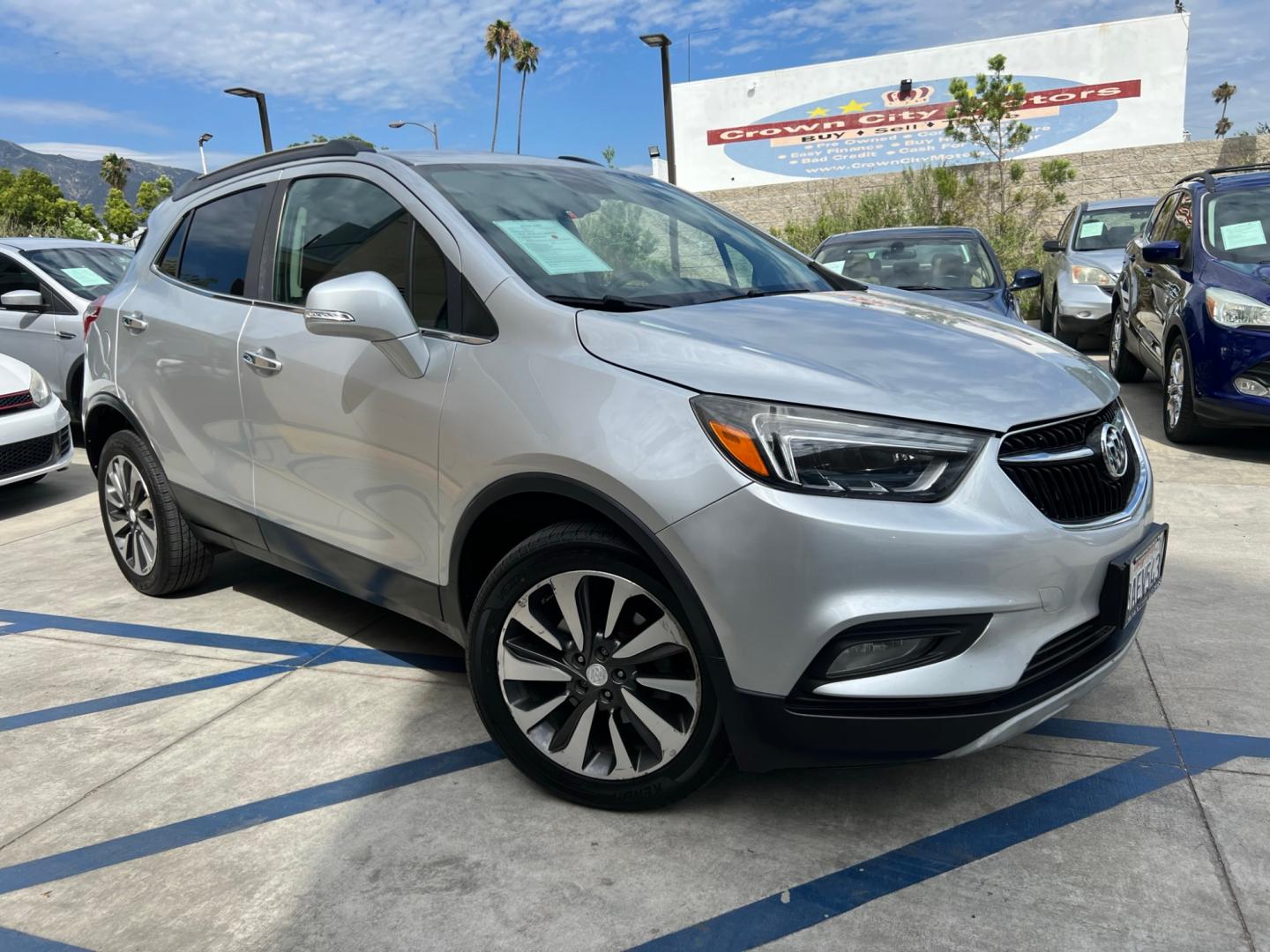 2018 Silver Buick Encore Essence AWD (KL4CJGSB7JB) with an 1.4L L4 DOHC 16V TURBO engine, 6A transmission, located at 30 S. Berkeley Avenue, Pasadena, CA, 91107, (626) 248-7567, 34.145447, -118.109398 - Crown City Motors is a used “Buy Here Pay Here” car dealer in Pasadena CA. “Buy Here Pay Here” financing, means that when you purchase your vehicle from our dealership, that you make the payments to the dealership as well. We do not need the banks approval to get you approved for a used auto - Photo#3