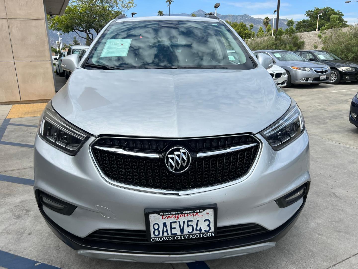 2018 Silver Buick Encore Essence AWD (KL4CJGSB7JB) with an 1.4L L4 DOHC 16V TURBO engine, 6A transmission, located at 30 S. Berkeley Avenue, Pasadena, CA, 91107, (626) 248-7567, 34.145447, -118.109398 - Crown City Motors is a used “Buy Here Pay Here” car dealer in Pasadena CA. “Buy Here Pay Here” financing, means that when you purchase your vehicle from our dealership, that you make the payments to the dealership as well. We do not need the banks approval to get you approved for a used auto - Photo#4