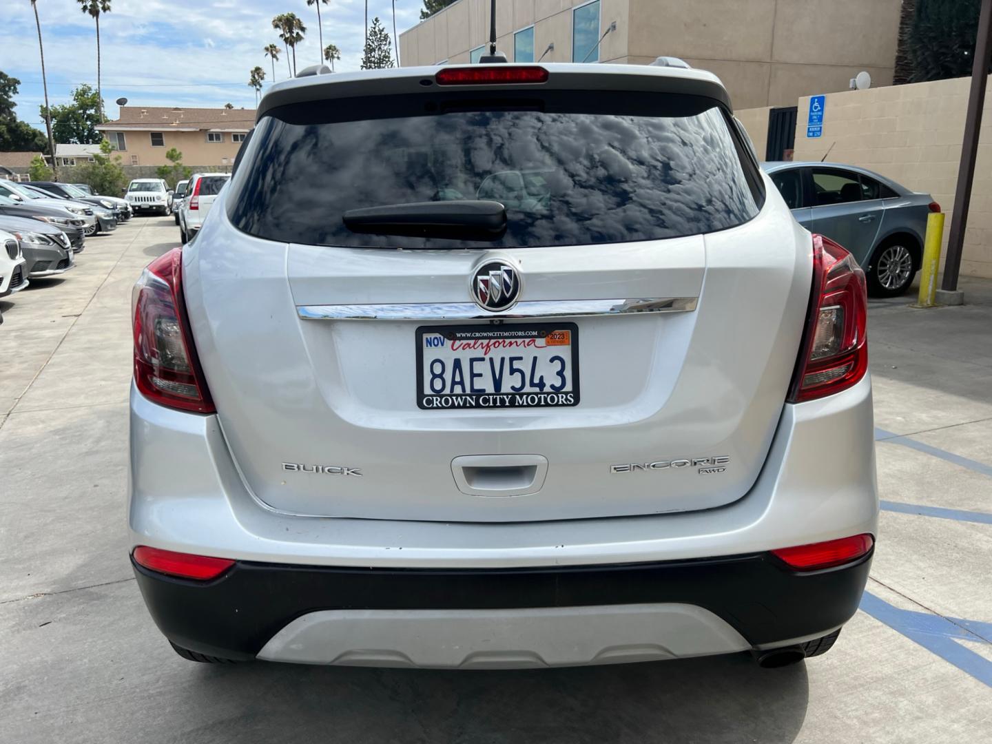 2018 Silver Buick Encore Essence AWD (KL4CJGSB7JB) with an 1.4L L4 DOHC 16V TURBO engine, 6A transmission, located at 30 S. Berkeley Avenue, Pasadena, CA, 91107, (626) 248-7567, 34.145447, -118.109398 - Crown City Motors is a used “Buy Here Pay Here” car dealer in Pasadena CA. “Buy Here Pay Here” financing, means that when you purchase your vehicle from our dealership, that you make the payments to the dealership as well. We do not need the banks approval to get you approved for a used auto - Photo#7