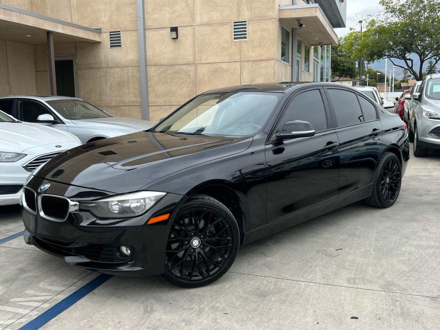 2013 Black /BLACK BMW 3-Series 328i Sedan - SULEV (WBA3C1G5XDN) with an 2.0L L4 DOHC 16V engine, Automatic transmission, located at 30 S. Berkeley Avenue, Pasadena, CA, 91107, (626) 248-7567, 34.145447, -118.109398 - Crown City Motors is a used “Buy Here Pay Here” car dealer in Pasadena CA. “Buy Here Pay Here” financing, means that when you purchase your vehicle from our dealership, that you make the payments to the dealership as well. We do not need the banks approval to get you approved for a used auto - Photo#0