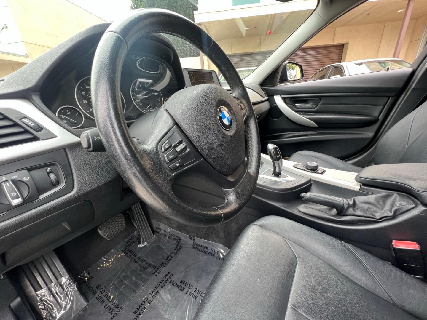 2013 Black /BLACK BMW 3-Series 328i Sedan - SULEV (WBA3C1G5XDN) with an 2.0L L4 DOHC 16V engine, Automatic transmission, located at 30 S. Berkeley Avenue, Pasadena, CA, 91107, (626) 248-7567, 34.145447, -118.109398 - Crown City Motors is a used “Buy Here Pay Here” car dealer in Pasadena CA. “Buy Here Pay Here” financing, means that when you purchase your vehicle from our dealership, that you make the payments to the dealership as well. We do not need the banks approval to get you approved for a used auto - Photo#8