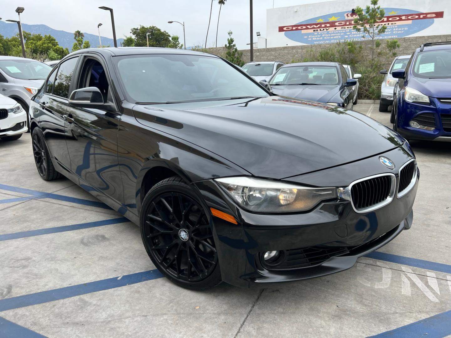 2013 Black /BLACK BMW 3-Series 328i Sedan - SULEV (WBA3C1G5XDN) with an 2.0L L4 DOHC 16V engine, Automatic transmission, located at 30 S. Berkeley Avenue, Pasadena, CA, 91107, (626) 248-7567, 34.145447, -118.109398 - Crown City Motors is a used “Buy Here Pay Here” car dealer in Pasadena CA. “Buy Here Pay Here” financing, means that when you purchase your vehicle from our dealership, that you make the payments to the dealership as well. We do not need the banks approval to get you approved for a used auto - Photo#4