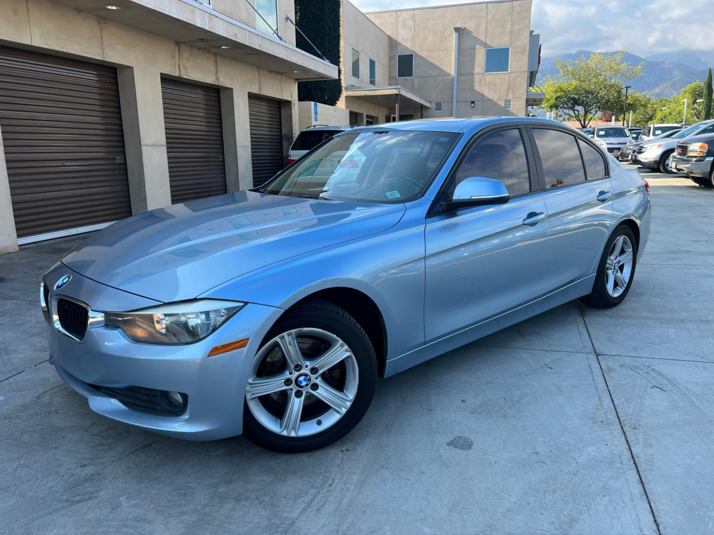 2014 BLUE /BEIGE BMW 3-Series 320i Sedan (WBA3B1G55EN) with an 2.0L L4 DOHC 16V engine, AUTOMATIC transmission, located at 30 S. Berkeley Avenue, Pasadena, CA, 91107, (626) 248-7567, 34.145447, -118.109398 - Crown City Motors is a used “Buy Here Pay Here” car dealer in Pasadena CA. “Buy Here Pay Here” financing, means that when you purchase your vehicle from our dealership, that you make the payments to the dealership as well. We do not need the banks approval to get you approved for a used auto - Photo#0