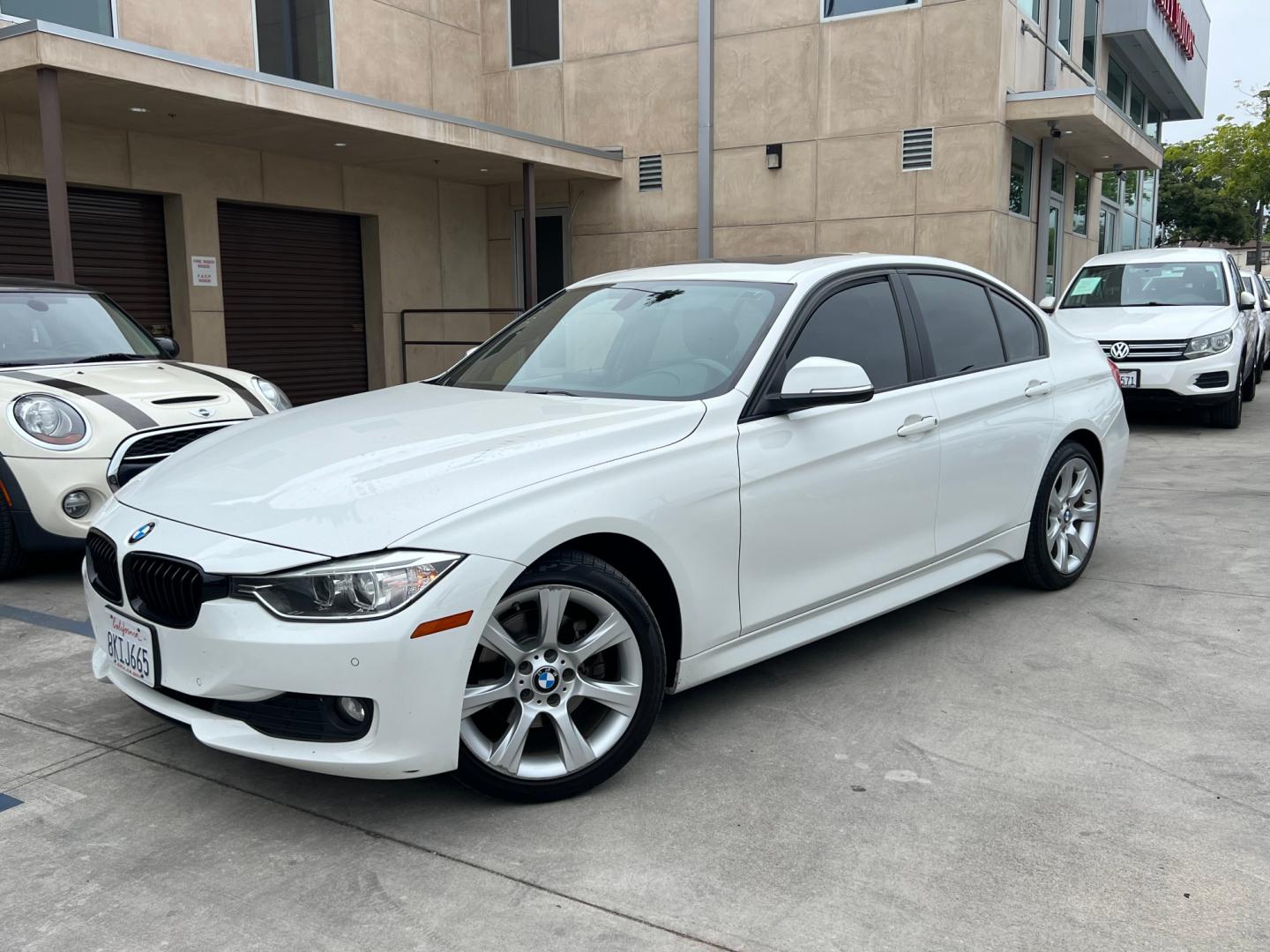 2014 White BMW 3-Series 320i xDrive (WBA3C3C54EK) with an 2.0L L4 DOHC 16V engine, AUTOMATIC transmission, located at 30 S. Berkeley Avenue, Pasadena, CA, 91107, (626) 248-7567, 34.145447, -118.109398 - Crown City Motors is a used “Buy Here Pay Here” car dealer in Pasadena CA. “Buy Here Pay Here” financing, means that when you purchase your vehicle from our dealership, that you make the payments to the dealership as well. We do not need the banks approval to get you approved for a used auto - Photo#0