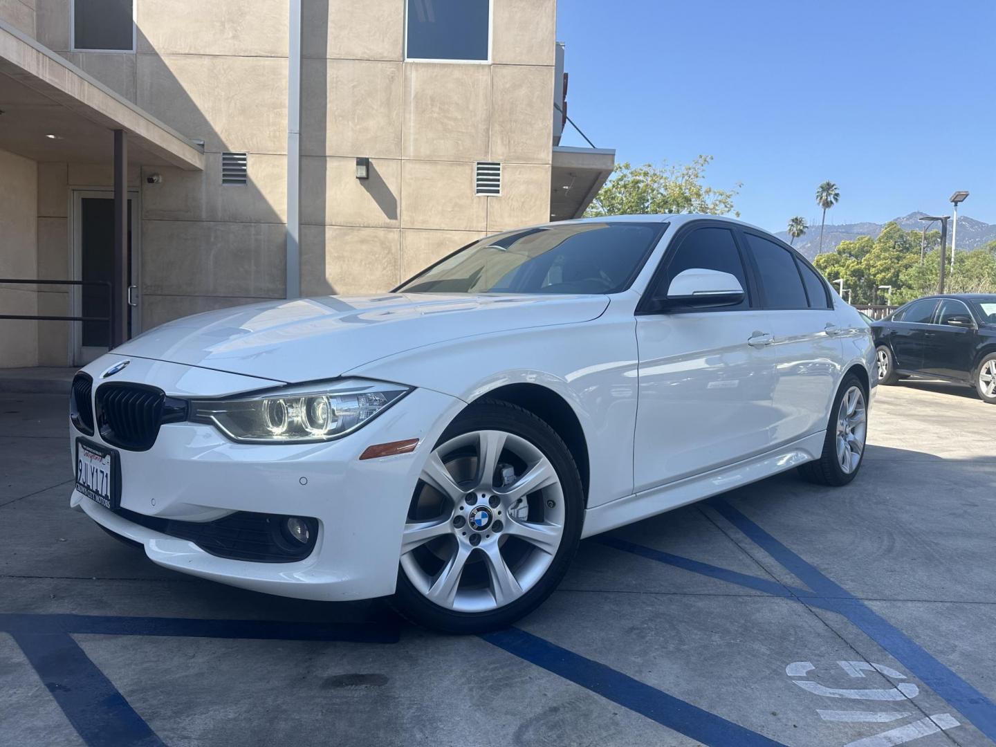 2014 White BMW 3-Series 320i xDrive (WBA3C3C54EK) with an 2.0L L4 DOHC 16V engine, AUTOMATIC transmission, located at 30 S. Berkeley Avenue, Pasadena, CA, 91107, (626) 248-7567, 34.145447, -118.109398 - Crown City Motors is a used “Buy Here Pay Here” car dealer in Pasadena CA. “Buy Here Pay Here” financing, means that when you purchase your vehicle from our dealership, that you make the payments to the dealership as well. We do not need the banks approval to get you approved for a used auto - Photo#1