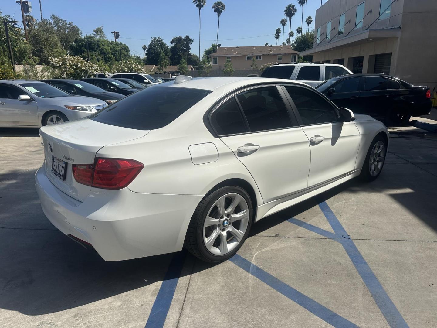 2014 White BMW 3-Series 320i xDrive (WBA3C3C54EK) with an 2.0L L4 DOHC 16V engine, AUTOMATIC transmission, located at 30 S. Berkeley Avenue, Pasadena, CA, 91107, (626) 248-7567, 34.145447, -118.109398 - Crown City Motors is a used “Buy Here Pay Here” car dealer in Pasadena CA. “Buy Here Pay Here” financing, means that when you purchase your vehicle from our dealership, that you make the payments to the dealership as well. We do not need the banks approval to get you approved for a used auto - Photo#5