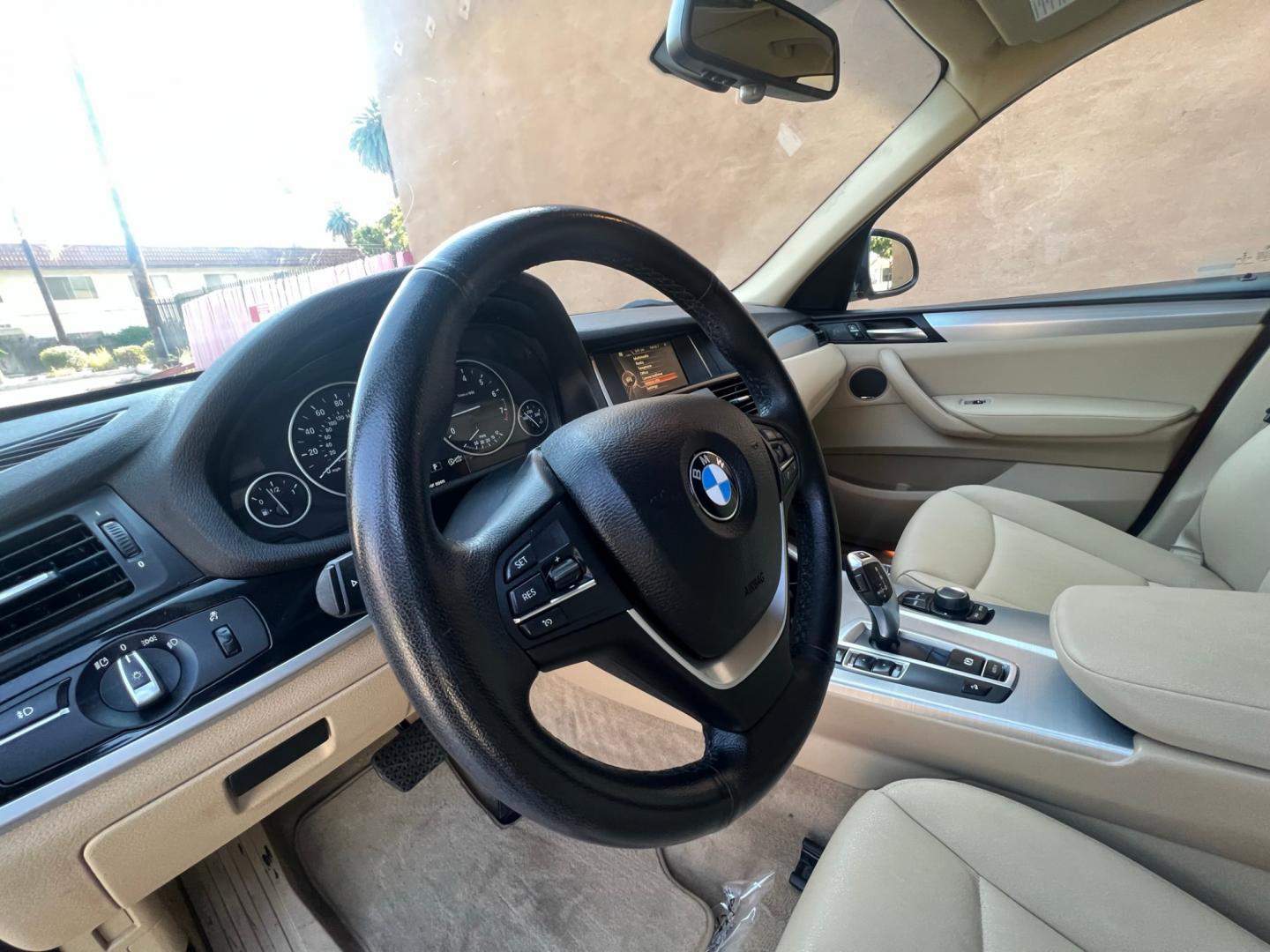 2016 RED /Tan BMW X3 xDrive28i (5UXWX9C50G0) with an 2.0L L4 DOHC 16V engine, 8-Speed Automatic transmission, located at 30 S. Berkeley Avenue, Pasadena, CA, 91107, (626) 248-7567, 34.145447, -118.109398 - Crown City Motors is a used “Buy Here Pay Here” car dealer in Pasadena CA. “Buy Here Pay Here” financing, means that when you purchase your vehicle from our dealership, that you make the payments to the dealership as well. We do not need the banks approval to get you approved for a used auto - Photo#21