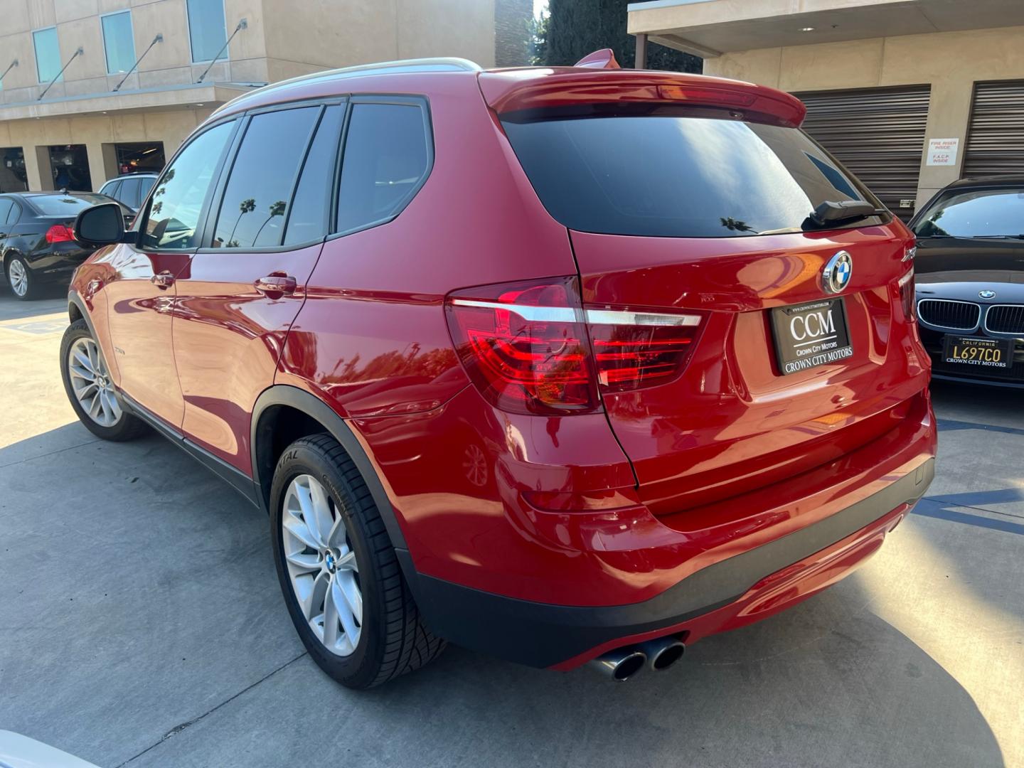 2016 RED /Tan BMW X3 xDrive28i (5UXWX9C50G0) with an 2.0L L4 DOHC 16V engine, 8-Speed Automatic transmission, located at 30 S. Berkeley Avenue, Pasadena, CA, 91107, (626) 248-7567, 34.145447, -118.109398 - Crown City Motors is a used “Buy Here Pay Here” car dealer in Pasadena CA. “Buy Here Pay Here” financing, means that when you purchase your vehicle from our dealership, that you make the payments to the dealership as well. We do not need the banks approval to get you approved for a used auto - Photo#2