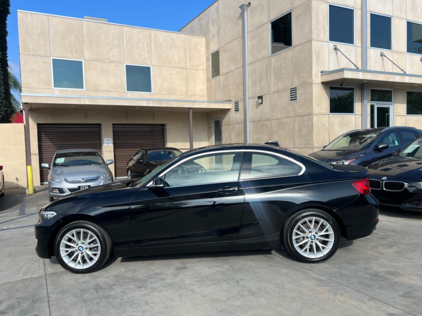 2016 Black BMW 2-Series 228i SULEV Coupe (WBA1F9C51GV) with an 2.0L L4 DOHC 16V engine, 8A transmission, located at 30 S. Berkeley Avenue, Pasadena, CA, 91107, (626) 248-7567, 34.145447, -118.109398 - Photo#3