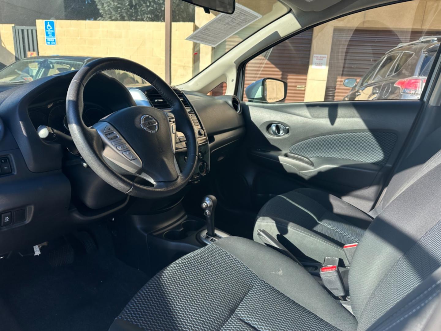 2016 White /Gray Nissan Versa Note S (3N1CE2CP8GL) with an 1.6L L4 DOHC 16V engine, autoamtic transmission, located at 30 S. Berkeley Avenue, Pasadena, CA, 91107, (626) 248-7567, 34.145447, -118.109398 - MPG! Good Value! The 2016 Nissan Versa Note Hatchback, a gem among pre-owned autos in Altadena, seamlessly blends efficiency, style, and practicality. For those navigating the bustling streets of Pasadena or the vast expanses of LA County, this hatchback promises a driving experience that's both ex - Photo#9