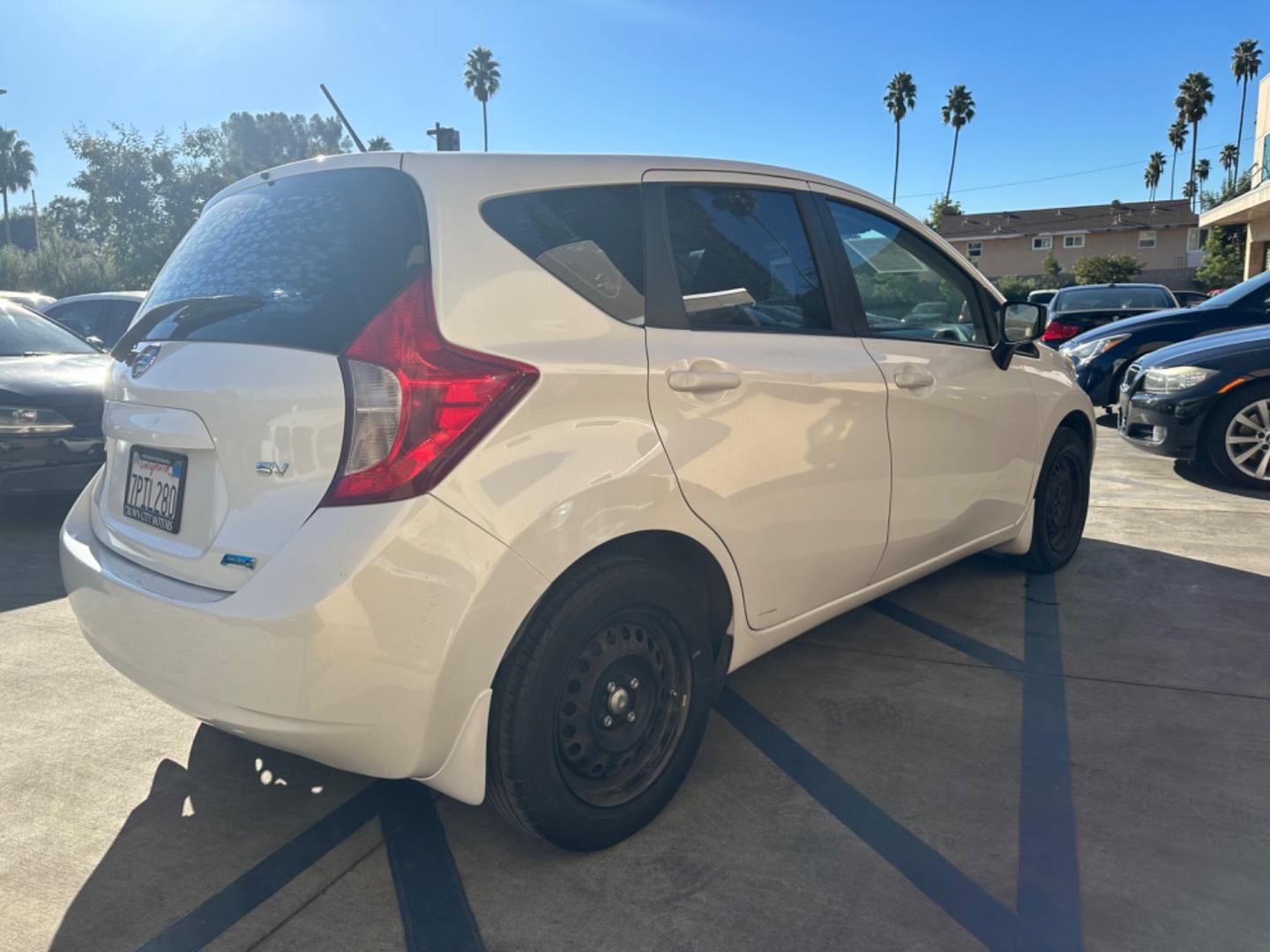 2016 White /Gray Nissan Versa Note S (3N1CE2CP8GL) with an 1.6L L4 DOHC 16V engine, autoamtic transmission, located at 30 S. Berkeley Avenue, Pasadena, CA, 91107, (626) 248-7567, 34.145447, -118.109398 - MPG! Good Value! The 2016 Nissan Versa Note Hatchback, a gem among pre-owned autos in Altadena, seamlessly blends efficiency, style, and practicality. For those navigating the bustling streets of Pasadena or the vast expanses of LA County, this hatchback promises a driving experience that's both ex - Photo#5