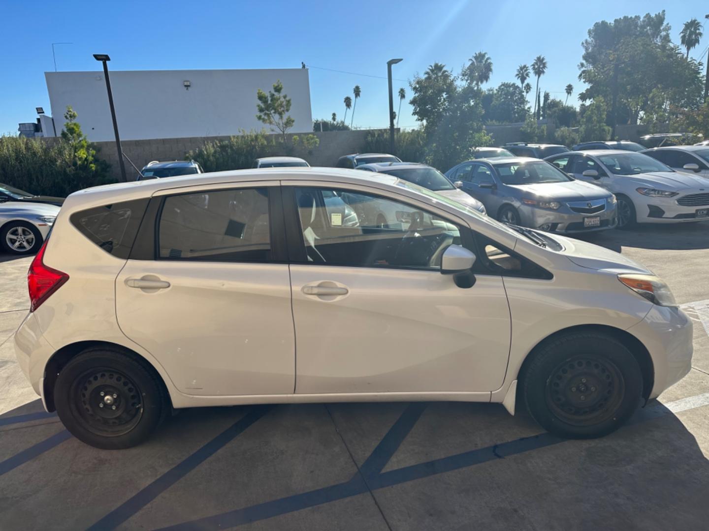 2016 White /Gray Nissan Versa Note S (3N1CE2CP8GL) with an 1.6L L4 DOHC 16V engine, autoamtic transmission, located at 30 S. Berkeley Avenue, Pasadena, CA, 91107, (626) 248-7567, 34.145447, -118.109398 - MPG! Good Value! The 2016 Nissan Versa Note Hatchback, a gem among pre-owned autos in Altadena, seamlessly blends efficiency, style, and practicality. For those navigating the bustling streets of Pasadena or the vast expanses of LA County, this hatchback promises a driving experience that's both ex - Photo#6