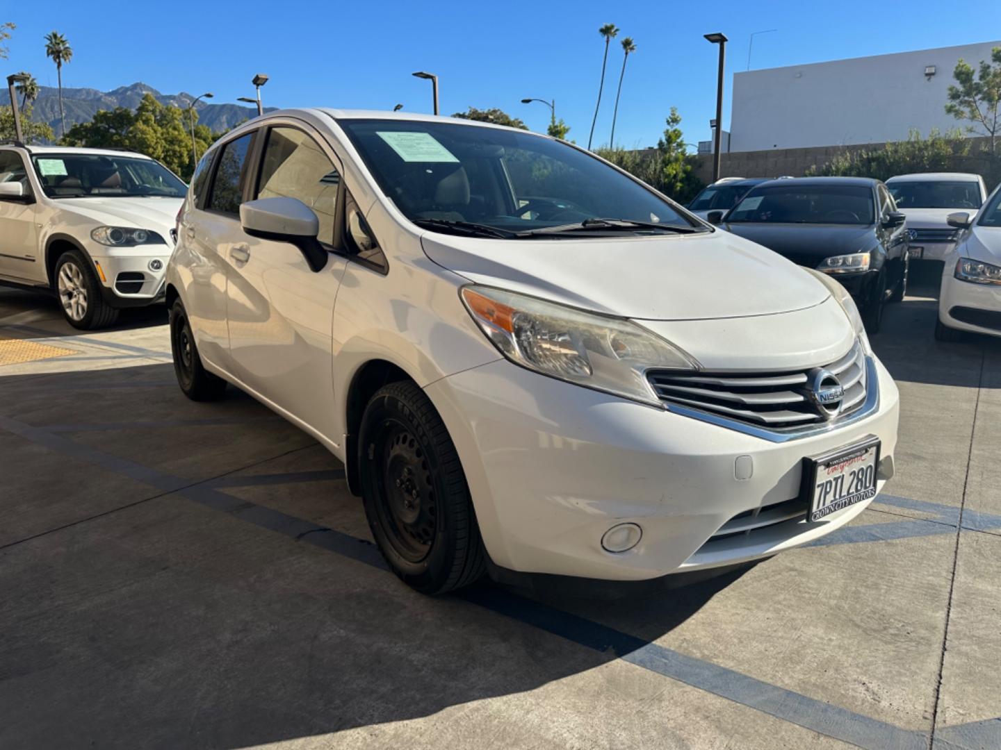 2016 White /Gray Nissan Versa Note S (3N1CE2CP8GL) with an 1.6L L4 DOHC 16V engine, autoamtic transmission, located at 30 S. Berkeley Avenue, Pasadena, CA, 91107, (626) 248-7567, 34.145447, -118.109398 - MPG! Good Value! The 2016 Nissan Versa Note Hatchback, a gem among pre-owned autos in Altadena, seamlessly blends efficiency, style, and practicality. For those navigating the bustling streets of Pasadena or the vast expanses of LA County, this hatchback promises a driving experience that's both ex - Photo#7