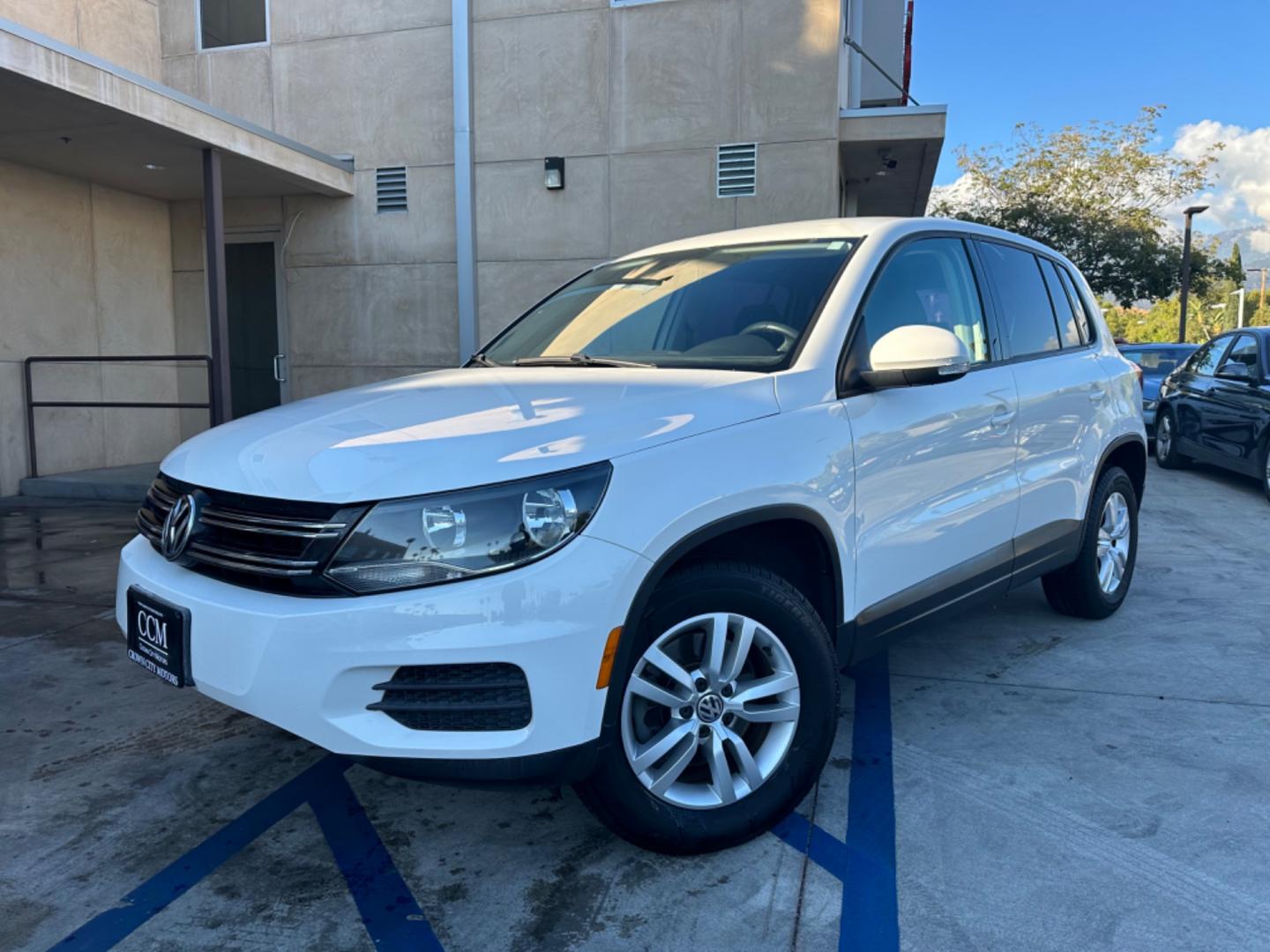 2013 WHITE /BLACK Volkswagen Tiguan (WVGAV3AX8DW) , located at 30 S. Berkeley Avenue, Pasadena, CA, 91107, (626) 248-7567, 34.145447, -118.109398 - Crown City Motors is a used “Buy Here Pay Here” car dealer in Pasadena CA. “Buy Here Pay Here” financing, means that when you purchase your vehicle from our dealership, that you make the payments to the dealership as well. We do not need the banks approval to get you approved for a used auto - Photo#0