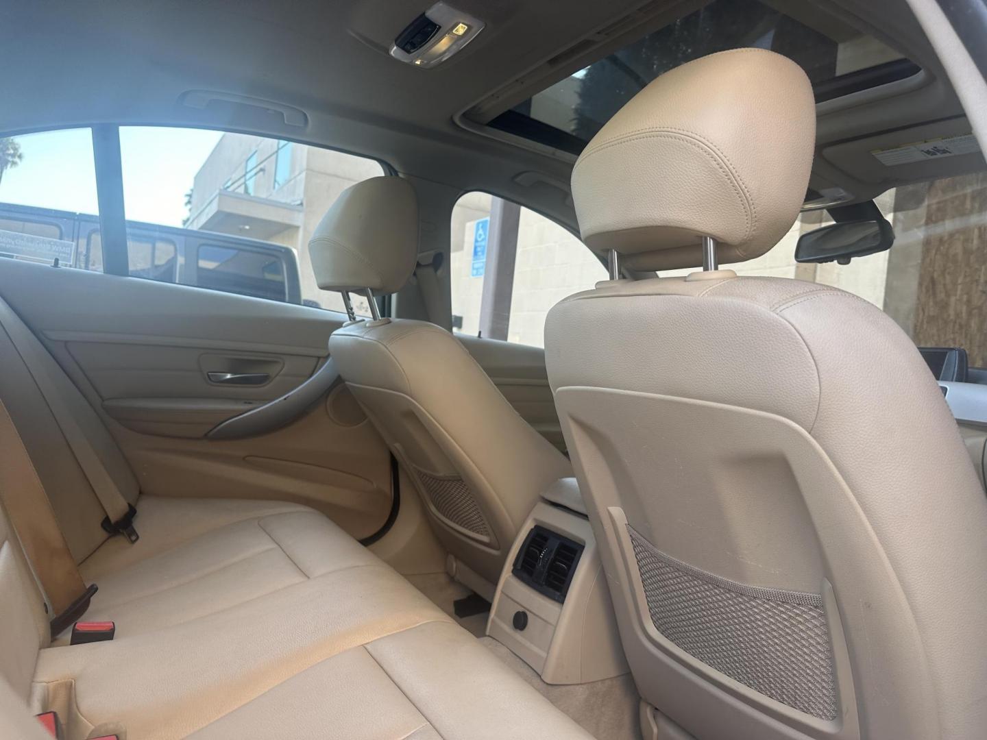 2013 White /Tan BMW 3-Series Leather (WBA3C3C56DF) with an 4 Cylinder engine, Automatic transmission, located at 30 S. Berkeley Avenue, Pasadena, CA, 91107, (626) 248-7567, 34.145447, -118.109398 - Low Miles! Leather seats! ntroducing the 2013 BMW 3-Series 320i Sedan, a timeless blend of luxury, performance, and style. With its sleek design and impressive features, this vehicle is sure to turn heads on the road. And with only 88,248 miles on the odometer, it's a low-mileage gem, especially f - Photo#19