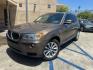 2013 Chestnut Bronze Metallic /Black BMW X3 Leather (5UXWX9C53D0) with an 2.0 engine, Automatic transmission, located at 30 S. Berkeley Avenue, Pasadena, CA, 91107, (626) 248-7567, 34.145447, -118.109398 - 2013 BMW X3 2.0 Turbo: Your Ideal Pre-Owned Luxury SUV in Pasadena, CA When searching for used BHPH cars in Pasadena, CA, the 2013 BMW X3 2.0 Turbo stands out as a premier choice. This luxury compact SUV combines performance, style, and comfort, making it a highly sought-after vehicle in the pre-ow - Photo#30