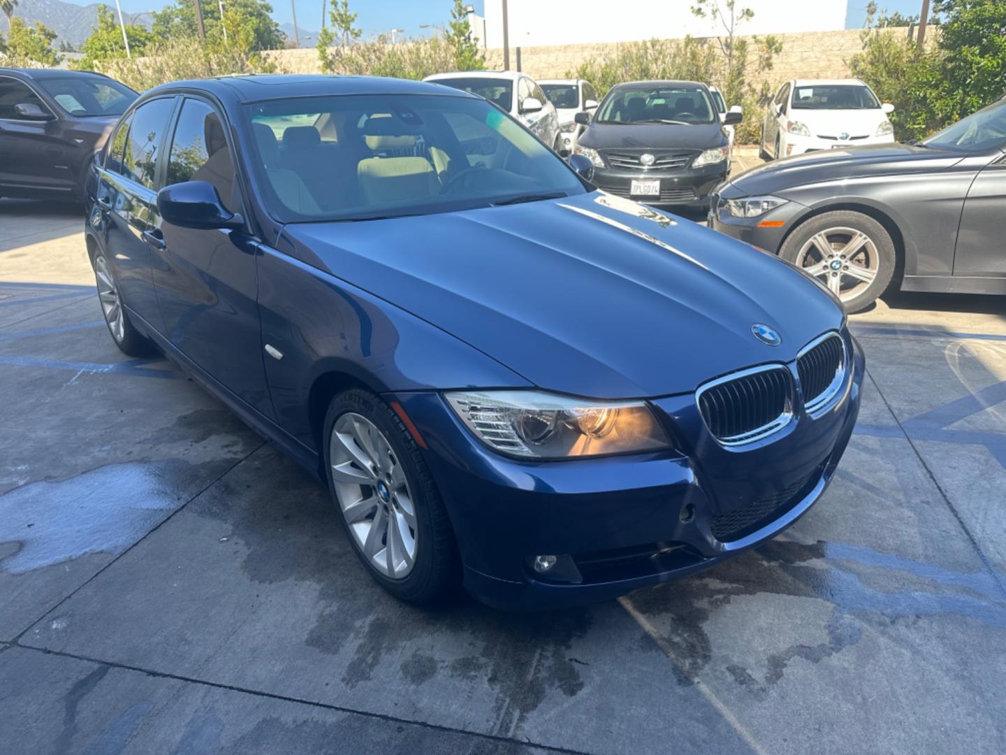 2011 Le Mans Blue Metallic /Black BMW 3-Series Leather (WBAPH7C51BA) with an 3.0 engine, Automatic transmission, located at 30 S. Berkeley Avenue, Pasadena, CA, 91107, (626) 248-7567, 34.145447, -118.109398 - Photo#6